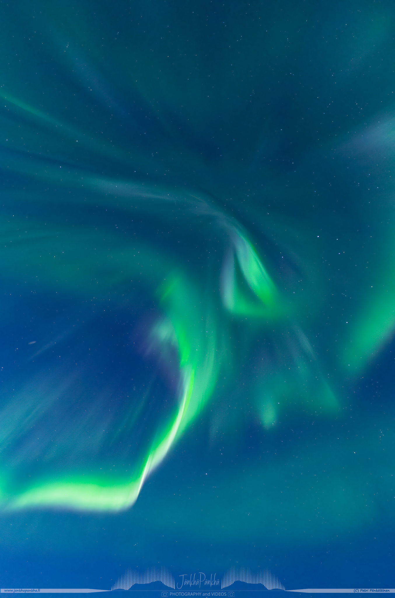 Northern lights overhead corona in Utsjoki. The full moon eats up the intensity of the northern lights.