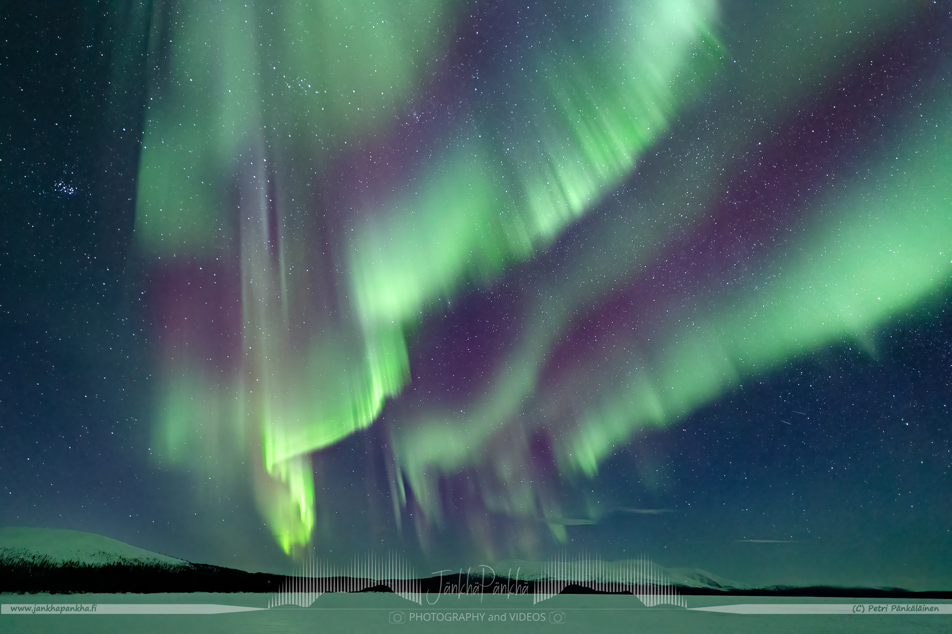 Full sky northern lights corona over the lake Pallasjärvi in Finland. The photo is from the Punainenhiekka hut. The  Punainenhiekka Day-use Hut is situated at the south end of Lake Pallasjärvi.