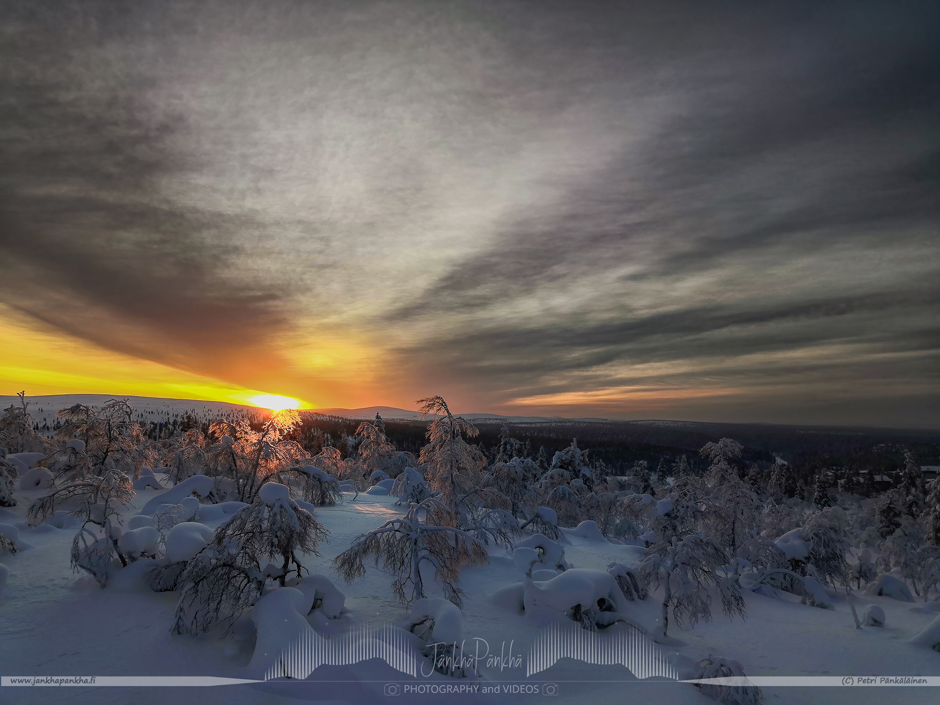 Sunset behind the fell Kiilopää in Inari.