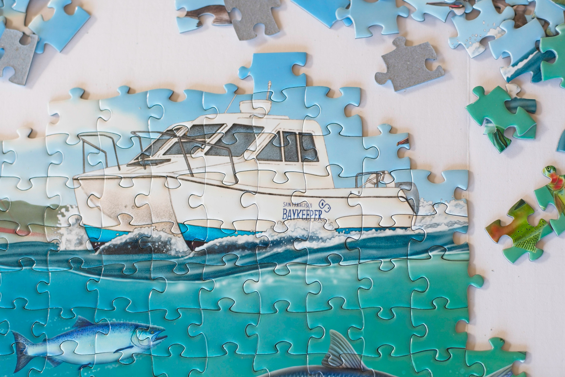 puzzle featuring San Francisco Baykeeper boat in action 