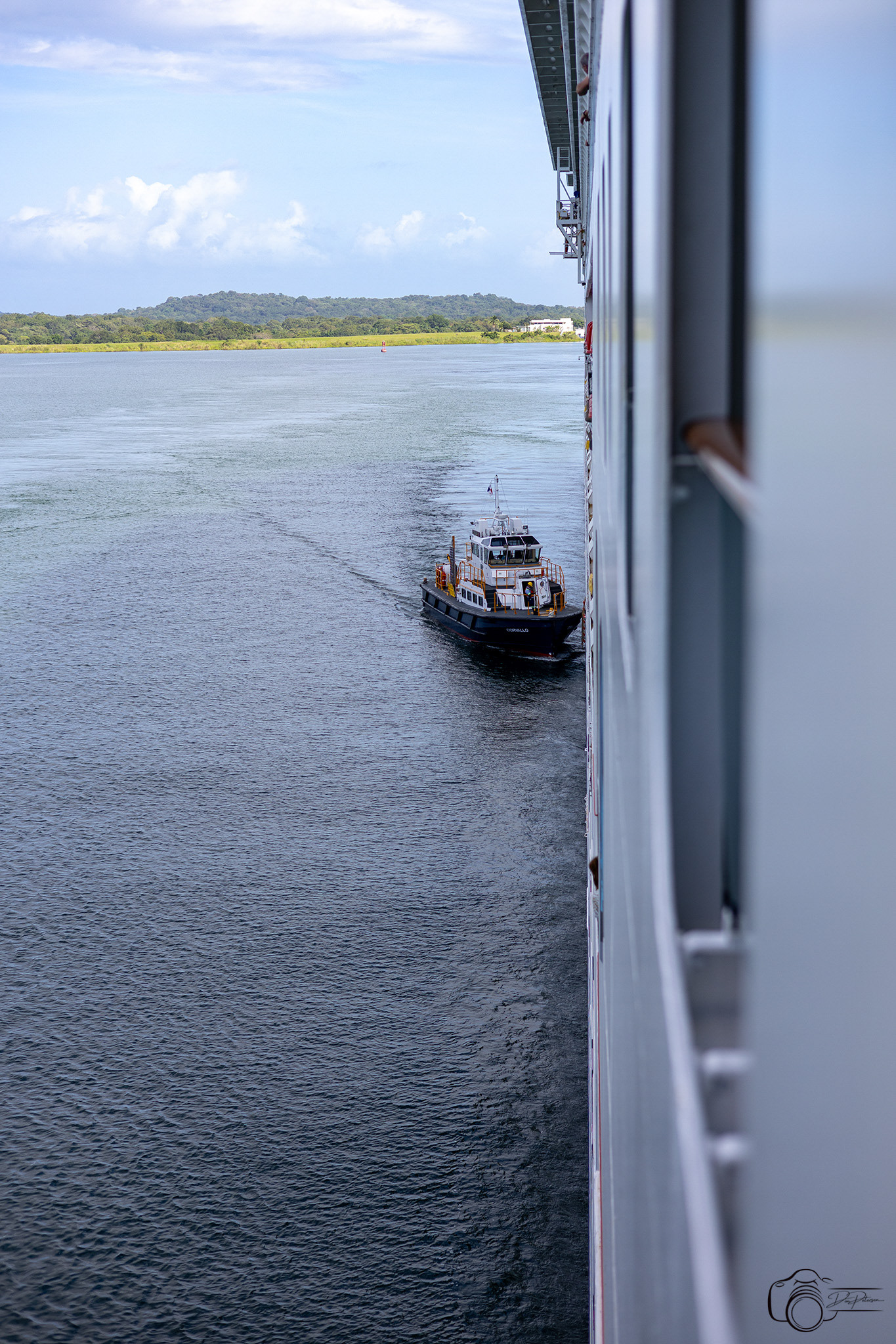 Tug Boat Escorting Ship