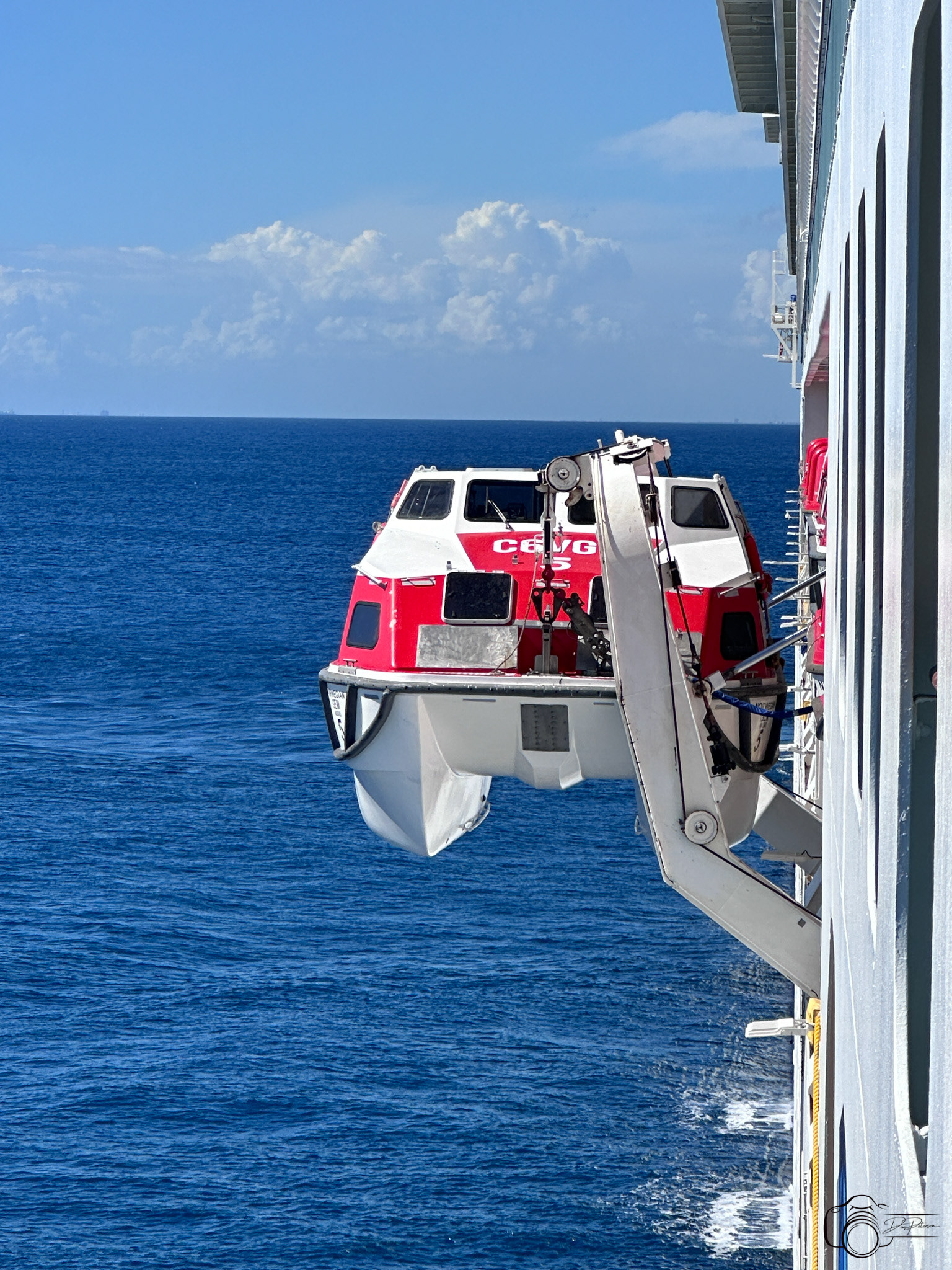 Lifeboat used as tender for Catalina Island, Dominican Republic being hoisted