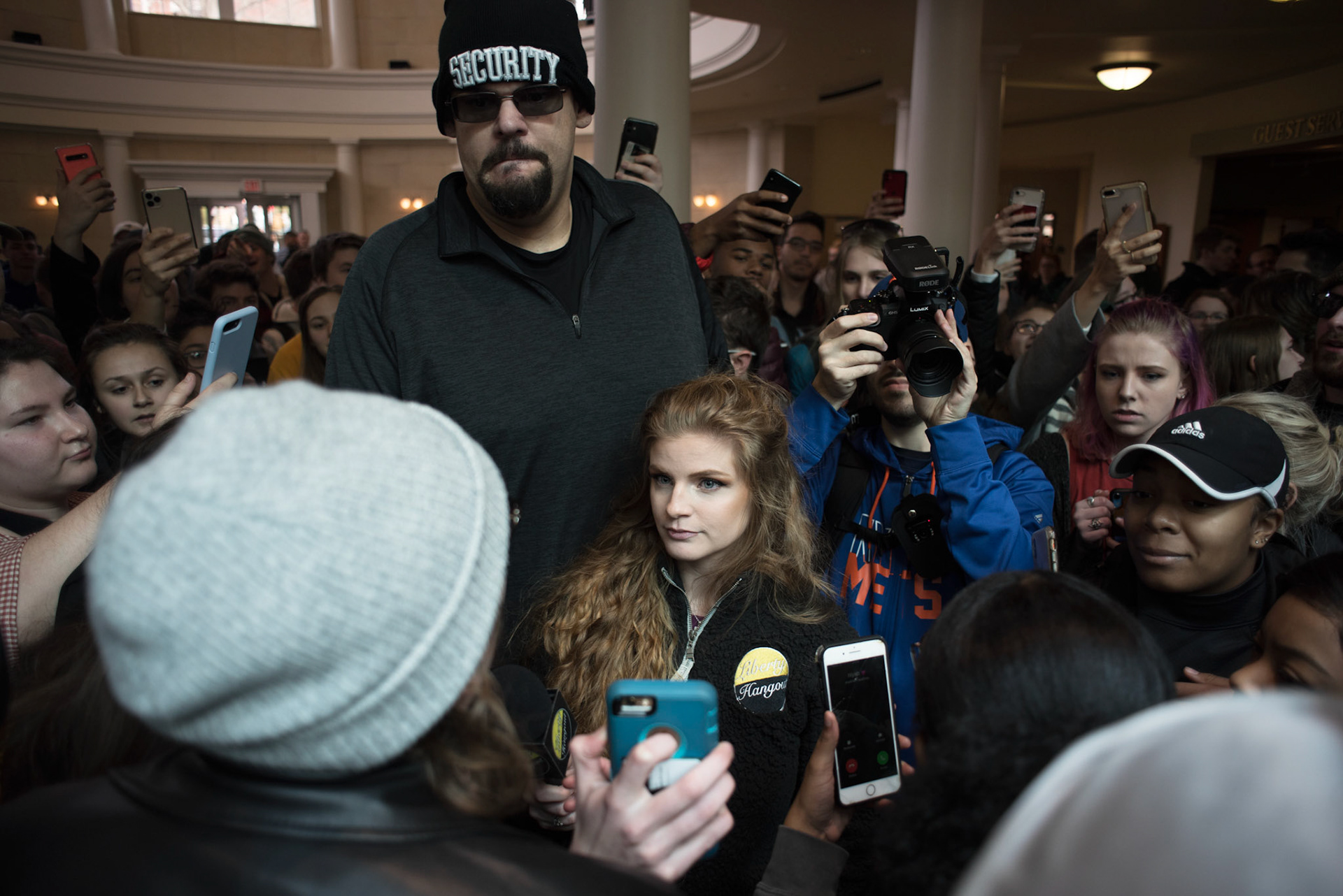 Kaitlin Bennett is swarmed by a crowd of students in Ohio University's Baker Center on Monday, February 17, 2020. Students shouted comments at Bennett including, "we hate fascist" and "no one wants you here". [Image published by CNN: https://www.cnn.com/2020/02/18/us/kaitlin-bennett-ohio-university-protests-trnd/index.html ] 