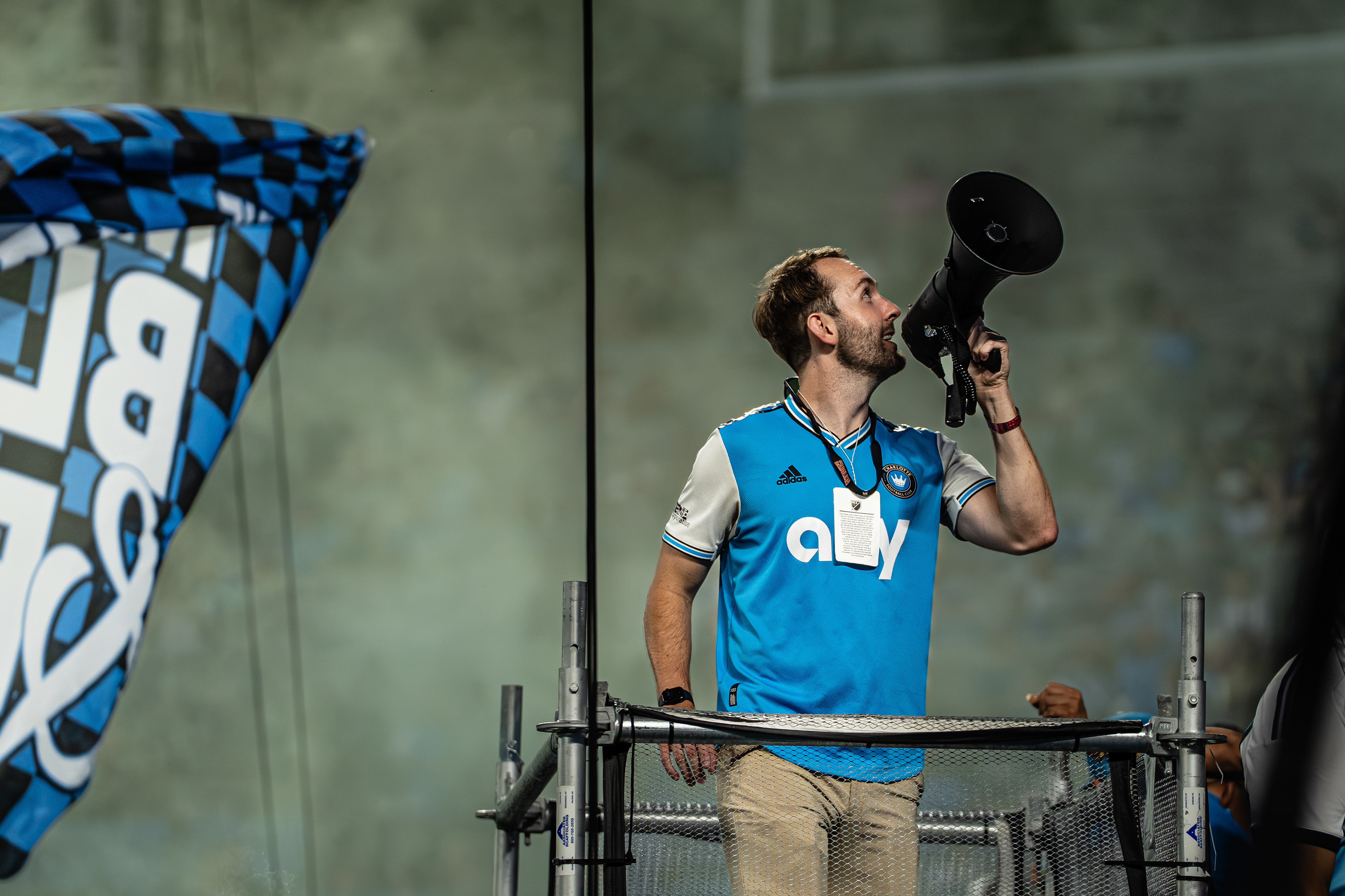 The supporters’ capo leads the crowd, driving the chants and lifting the atmosphere. © AndyMaxPhotography. All rights reserved.