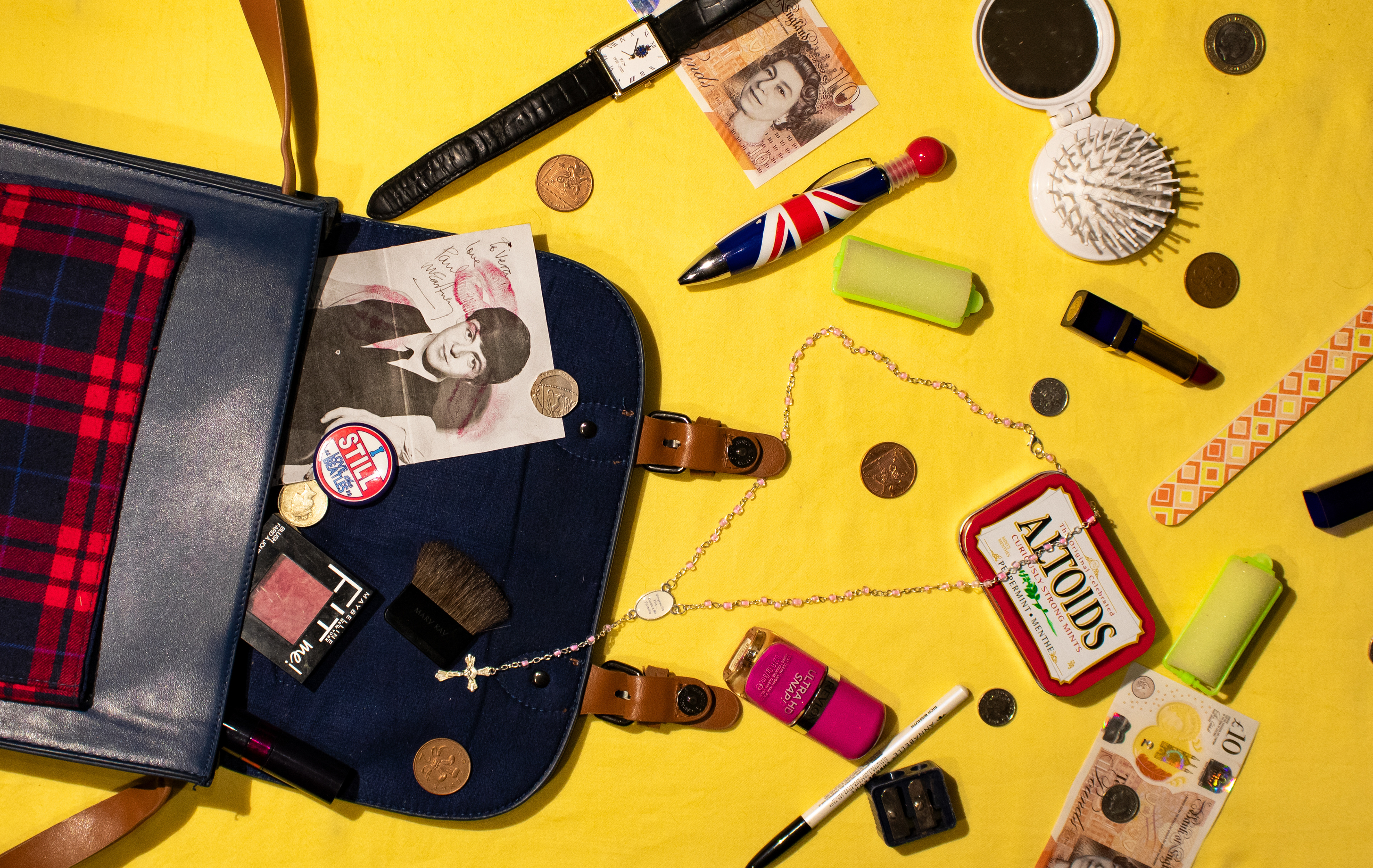 Paul's Girl School Bag, 2023. What does a young, boy crazy girl have to carry around with her? A proto photocard of Paul McCartney, naturally. Amongst other things, she carries loose change, mints -in case she runs into Paul, and a Union Flag pen.