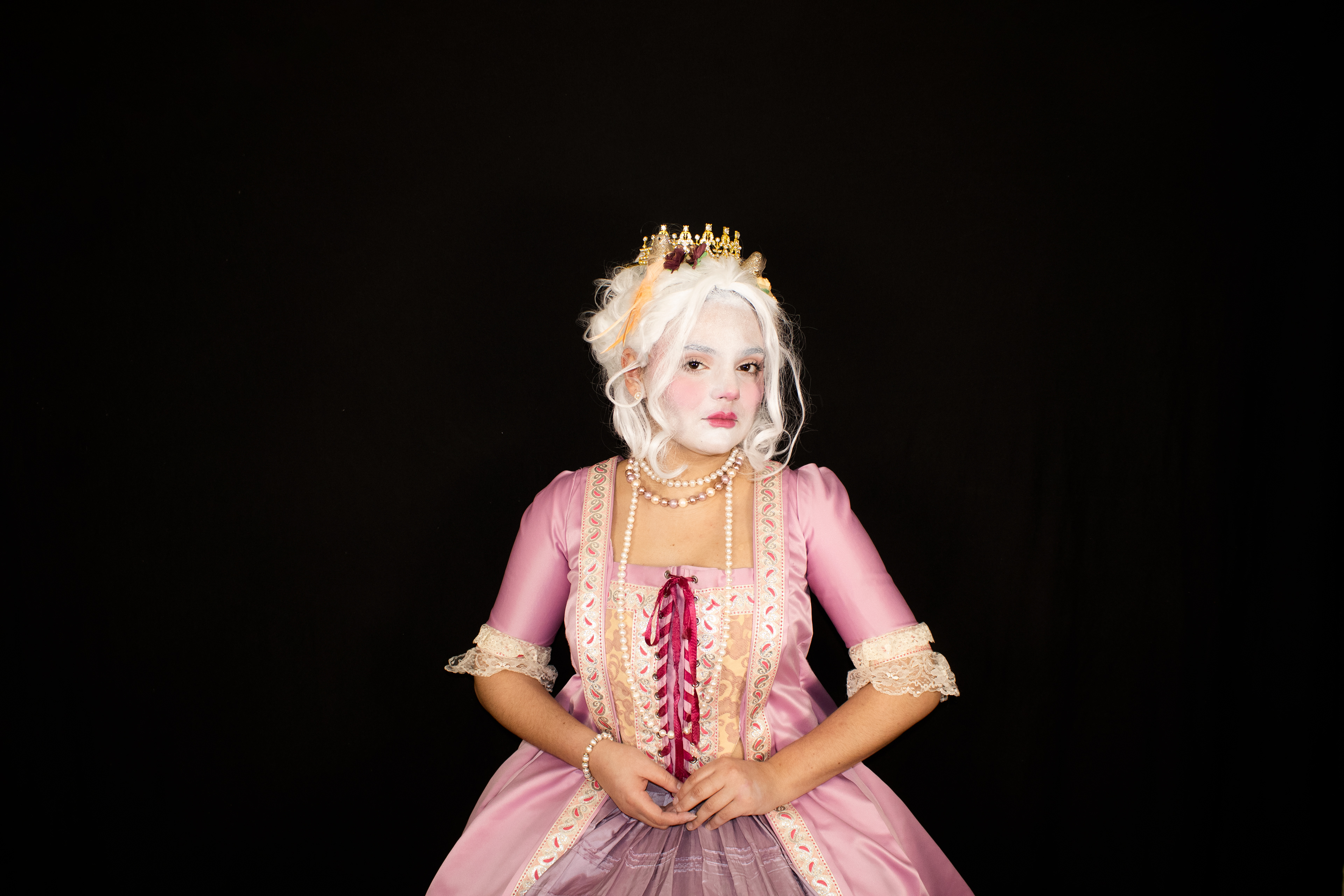 God Save The Queen, 2023. Duty, Servitude and the Modern Woman’, demonstrates the artist working through female architypes often served to viewers in media – the rich and selfish Queen, the tom-boy hero, who rejects her femininity for seriousness and martyrdom, and the fragile, porcelain doll who is one singular crack away from crumbling her façade of perfection. Through this work, the artist asks what femininity looks like in the case of broad, widely disseminated media, and how it affects ideas of femineity and feminism, identity and notions of belonging. 