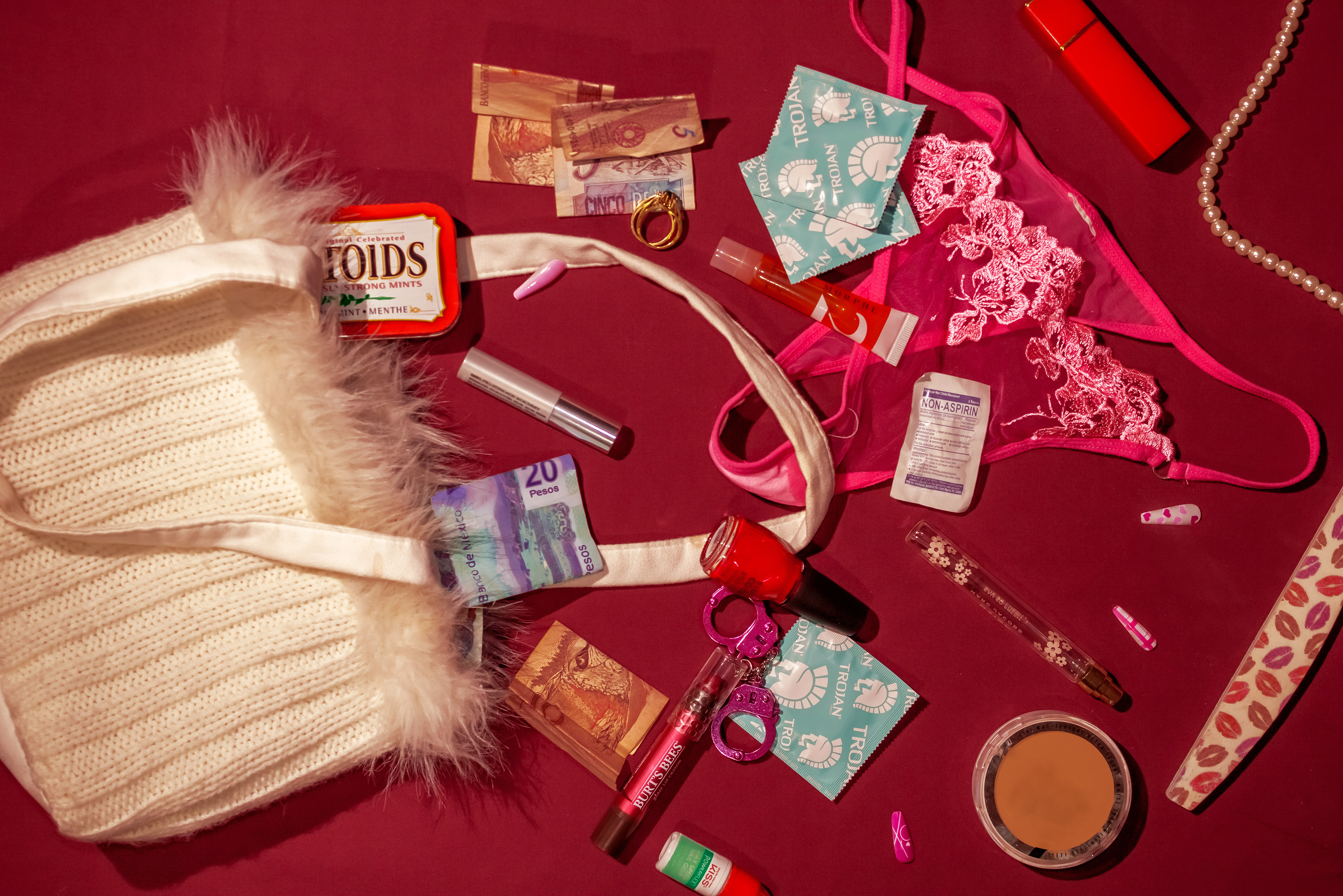 Call Girl Bag, 2023. This piece sees the contents of Call Girl's purse. This series wishes to highlight the similarities and differences between these women - who are they, what unites them, what is needed to get through their day to day life?