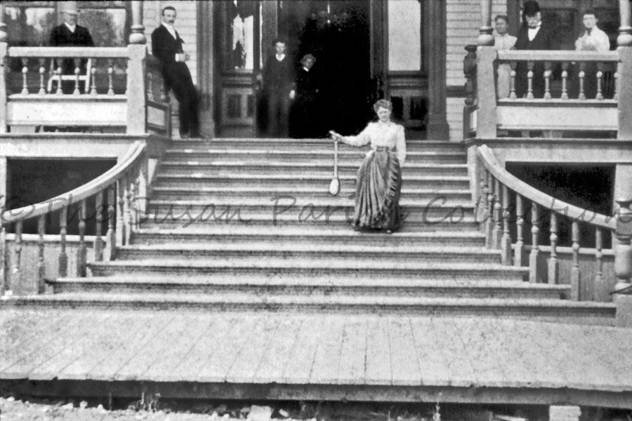 Gov. Ferry's daughter Lizzie on the steps of the Hotel Olympia holding a Geoduck