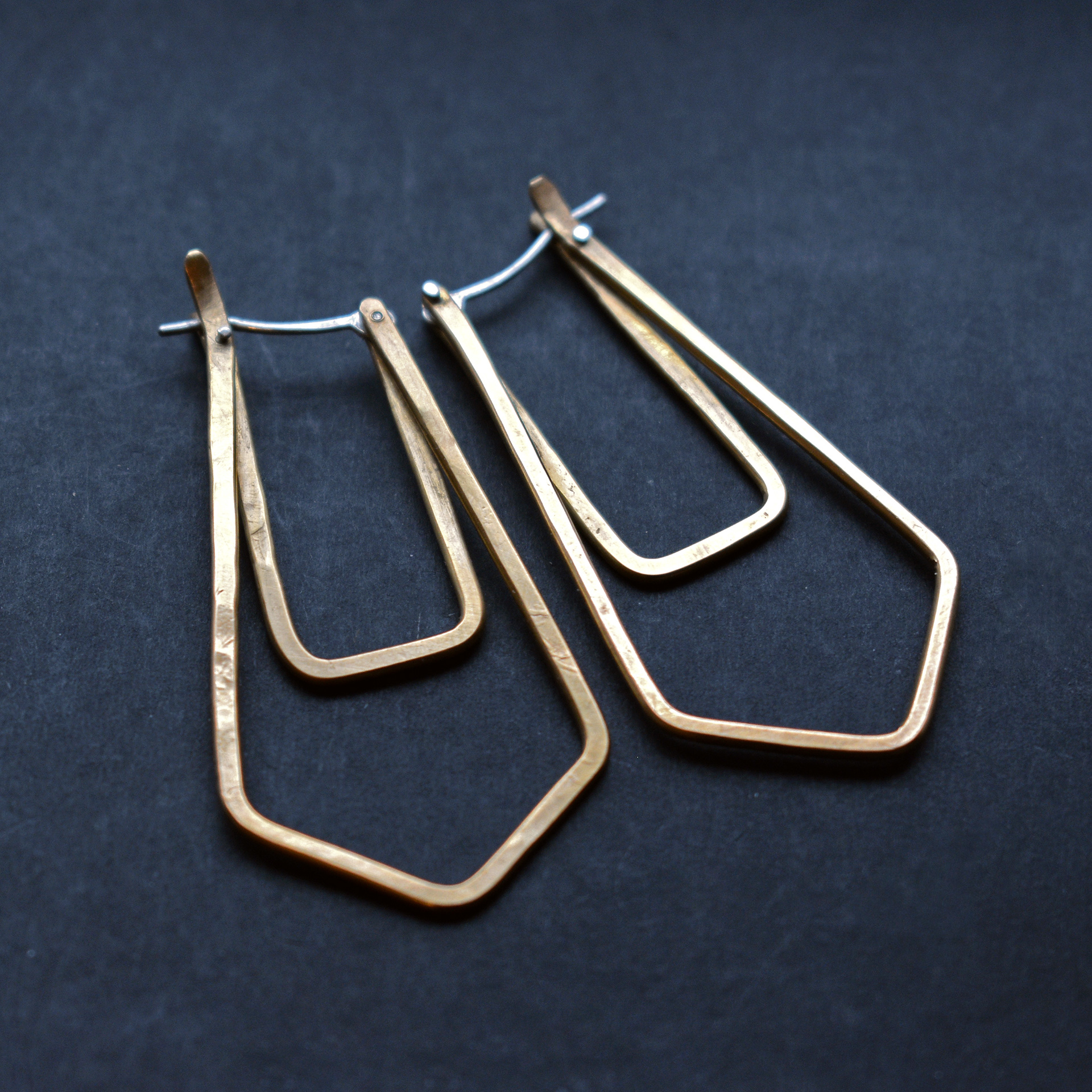 hinged brass hoops