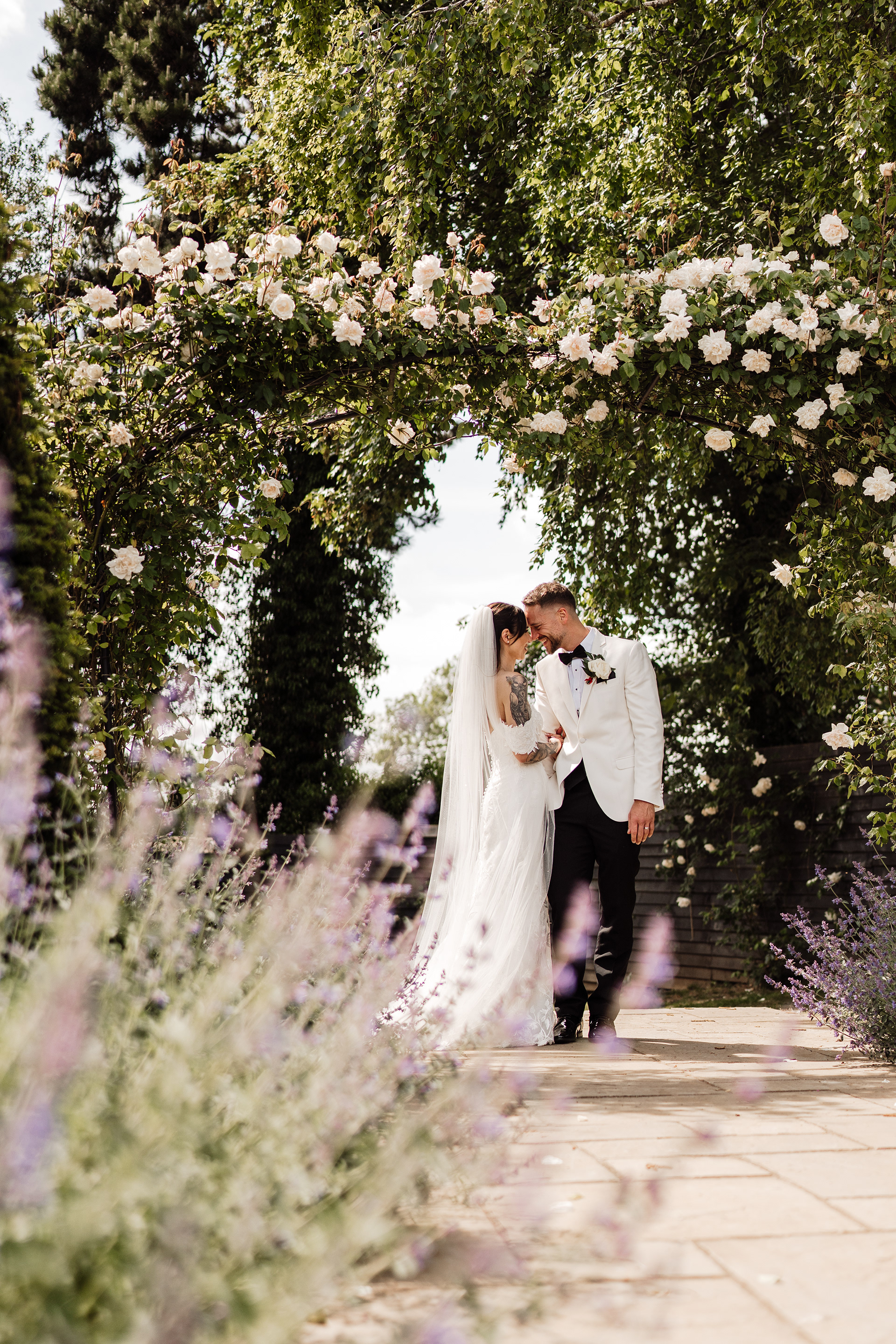 Luxury and romantic couple portraits by husband and wife photo and video team at Ashton Lodge Country House