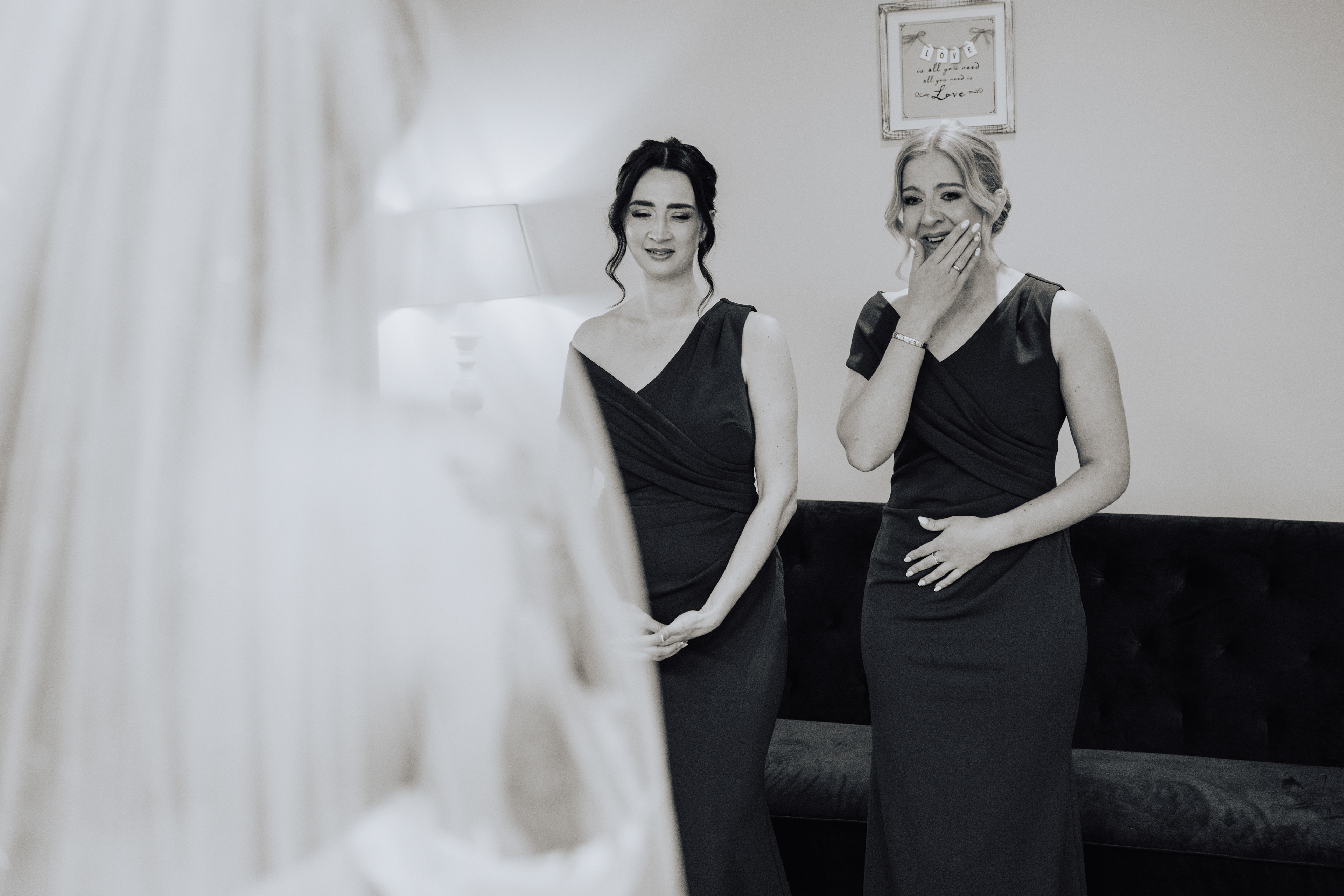 First look with bridesmaids by husband and wife photography and videography team at Ashton Lodge Country House