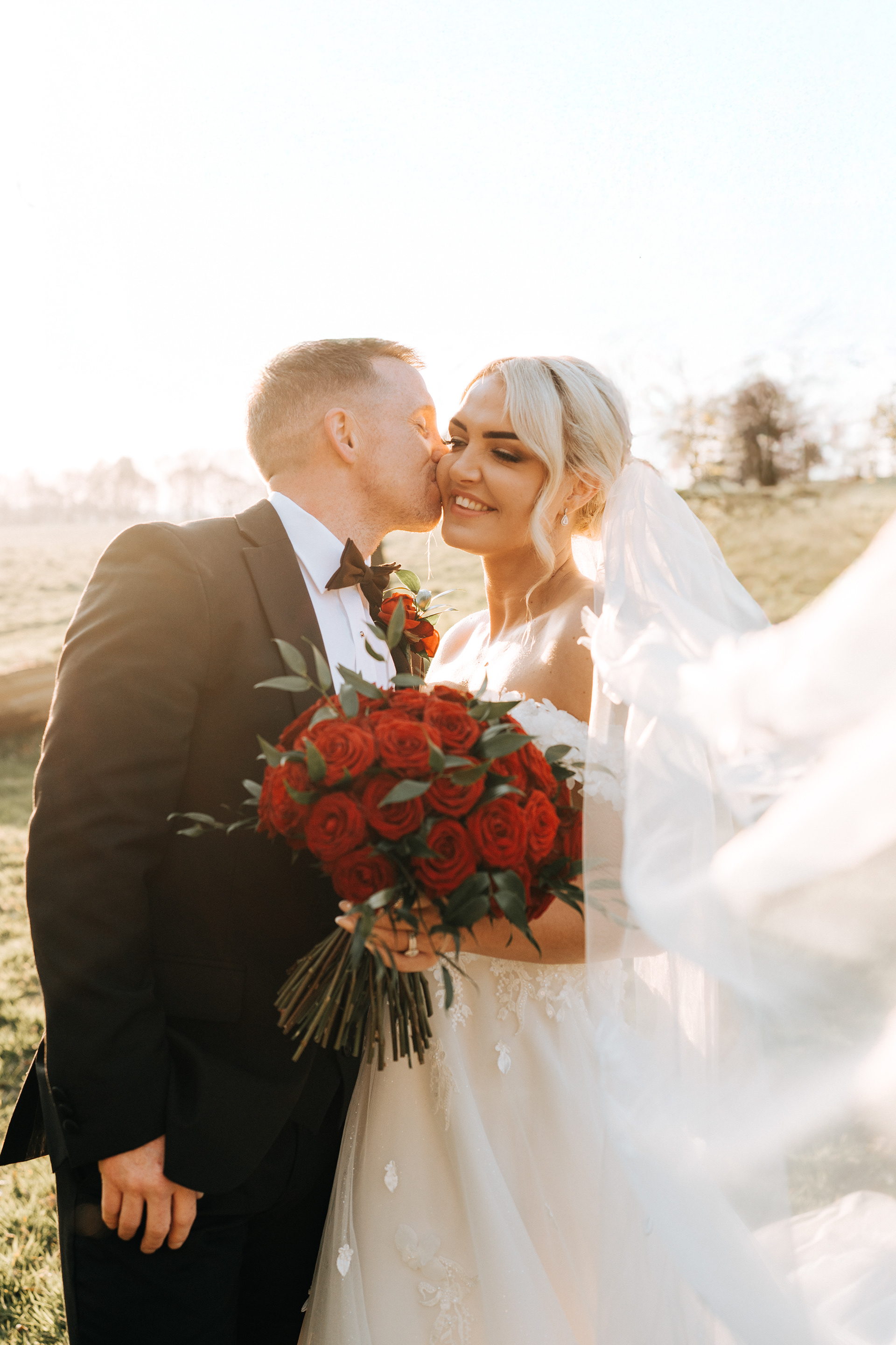 Golden hour couple portraits at Rivington Hall Barn – candid wedding photography
