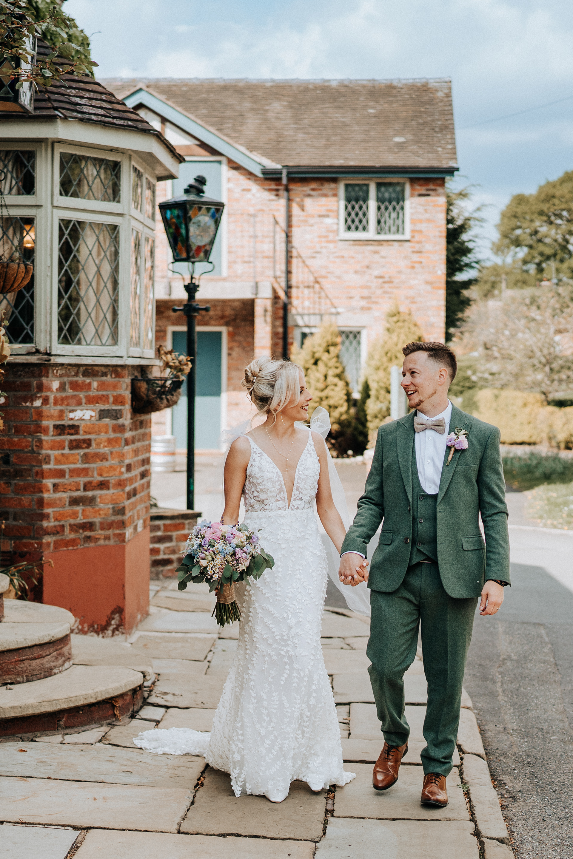 Candid wedding pictures by a husband and wife photography team in the North West