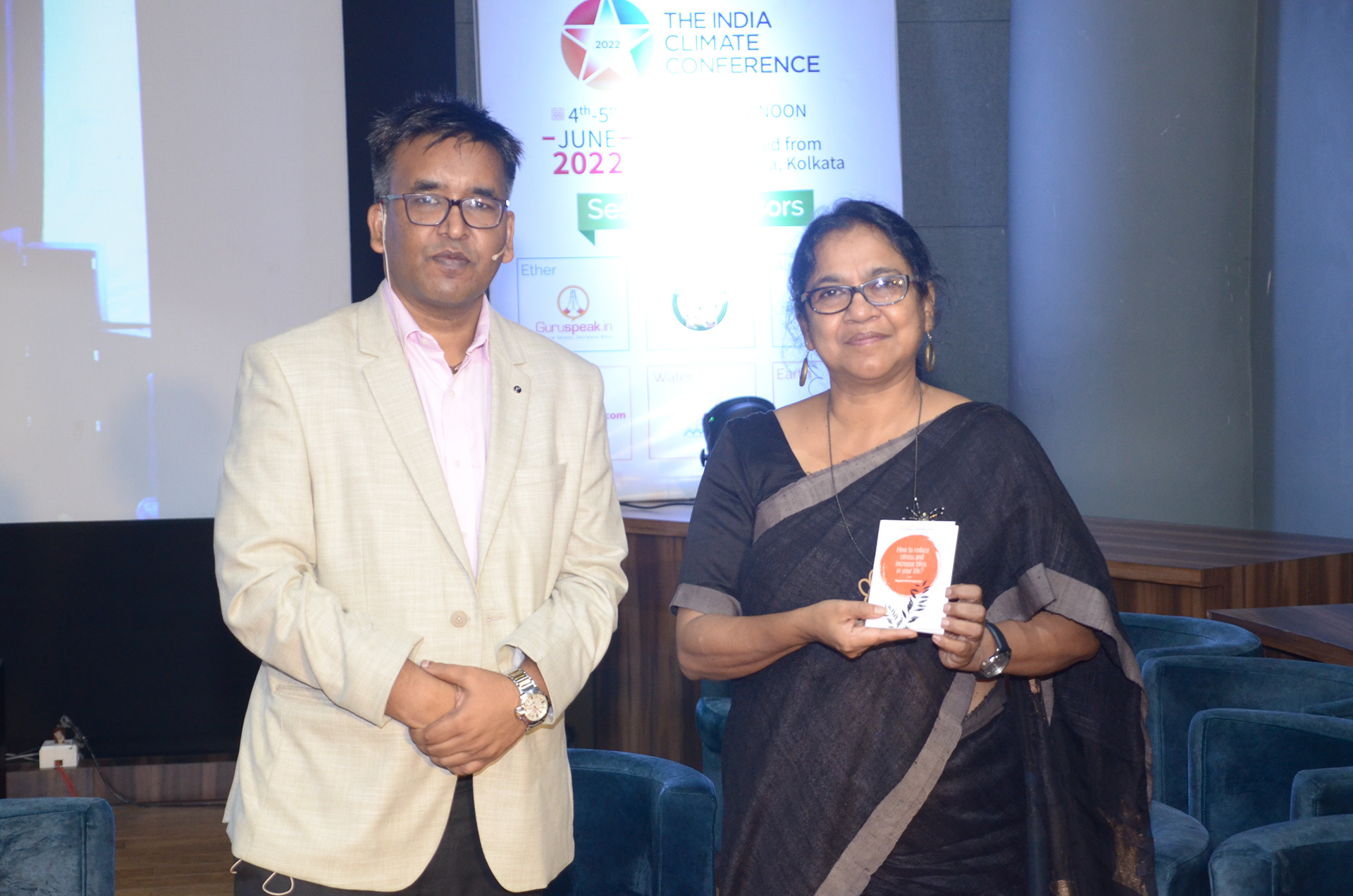Rajesh gifting his booklet on Stress Management to Ms. Ajanta Dey, Joint Secretary & Programme Director of the Nature Environment and Wildlife Society (NEWS)