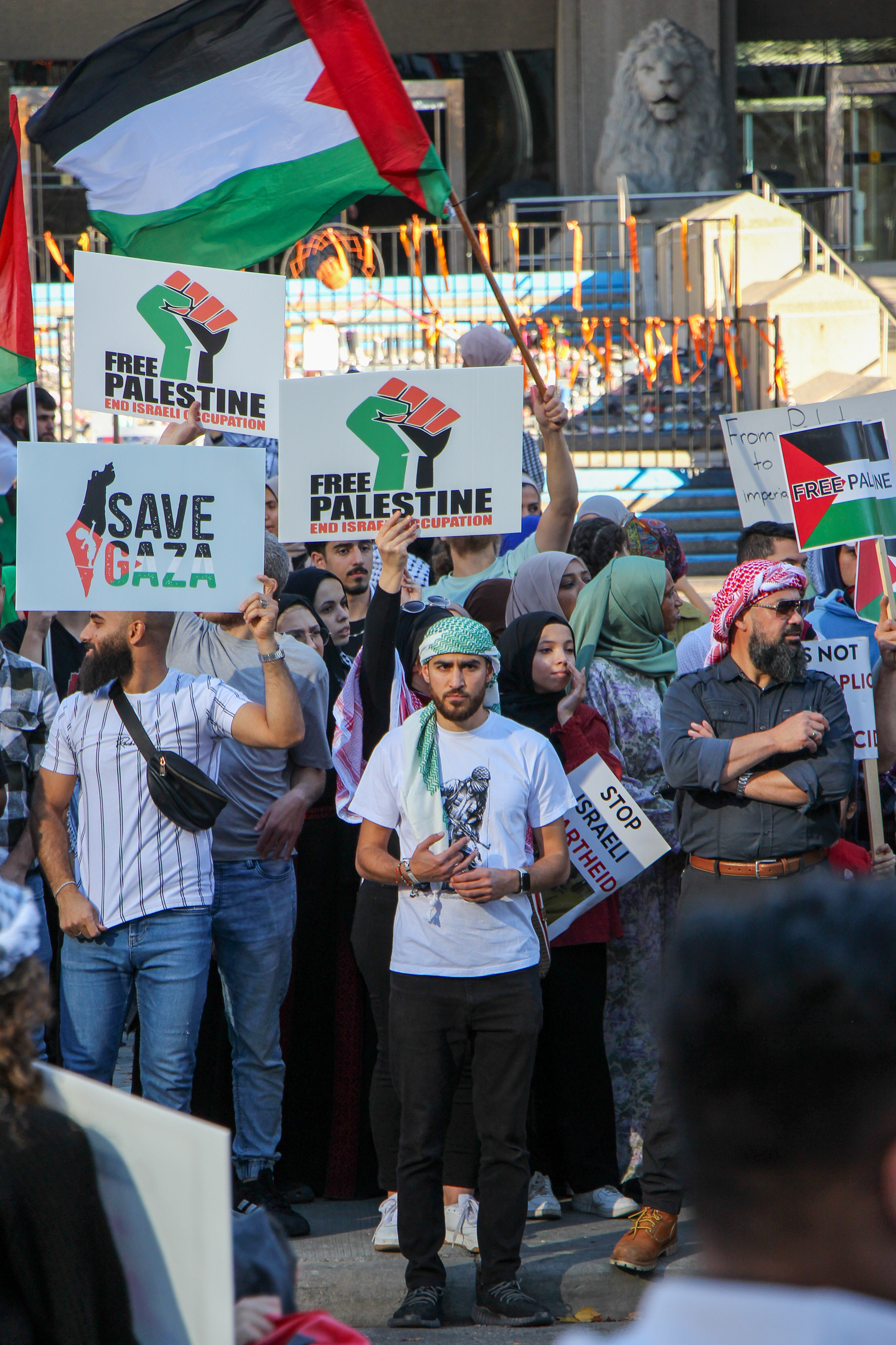 Protesters gather outside Calgary city hall for a Justice for Palestinians protest.
