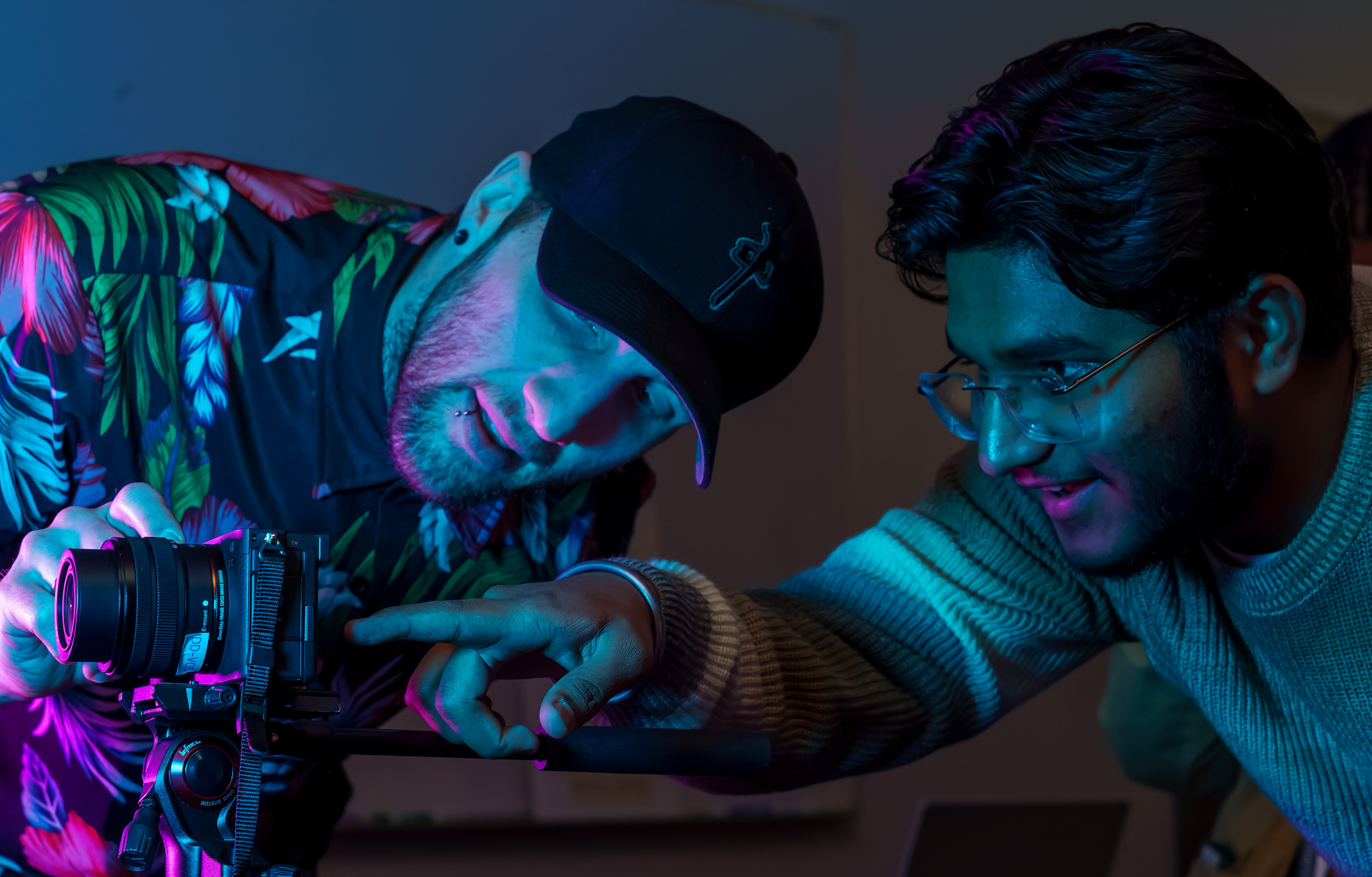 Interactive design program instructor Mitch George, left, configures a camera for a lighting demonstration in the Senator Burns Building at SAIT in Calgary on Wednesday, Feb. 12, 2025.