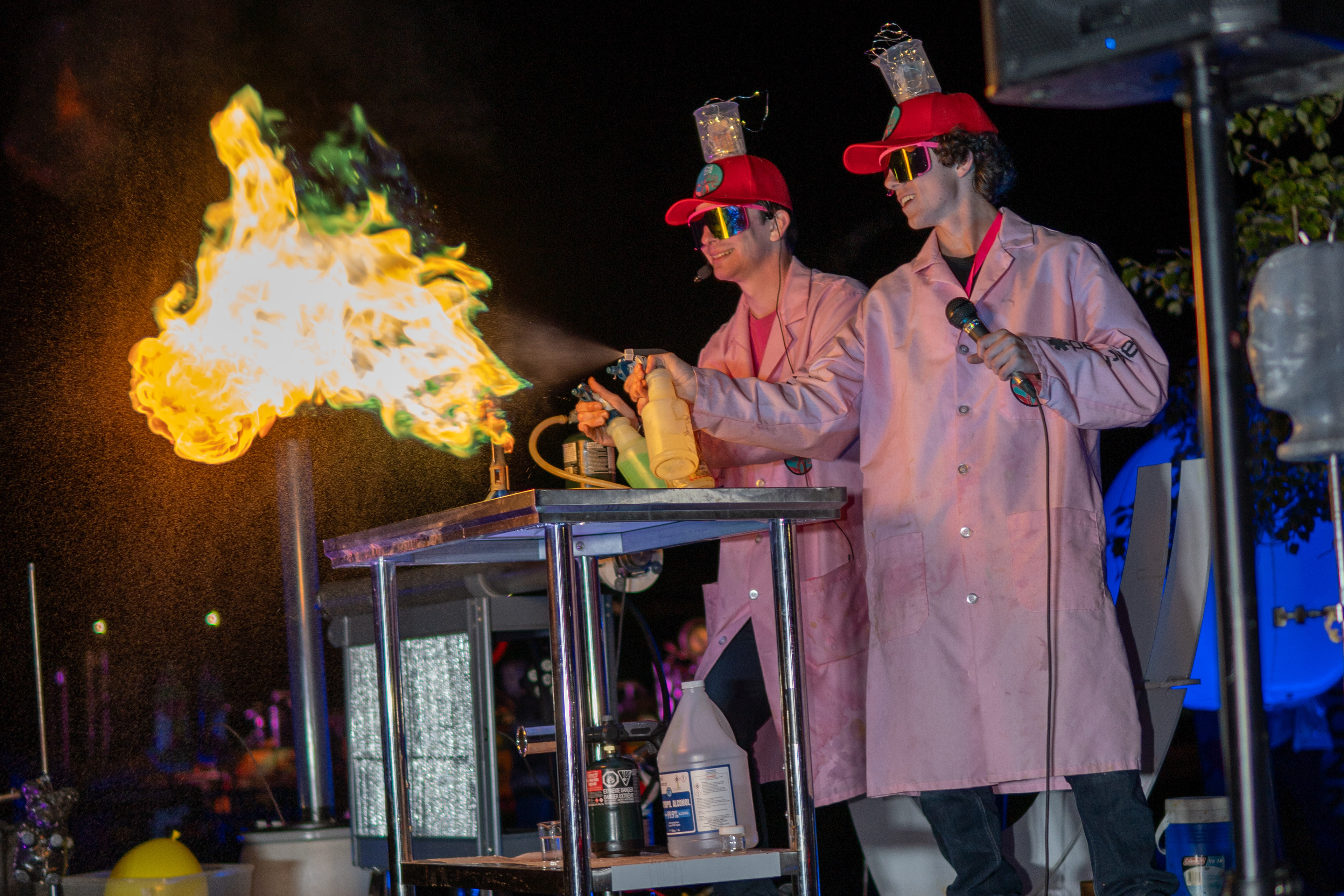 Two Beakerhead scientists demonstrate a copper sulphate experiment at beaker head at the TELUS Spark Science Centre in Calgary on Friday, Sept. 20, 2024.