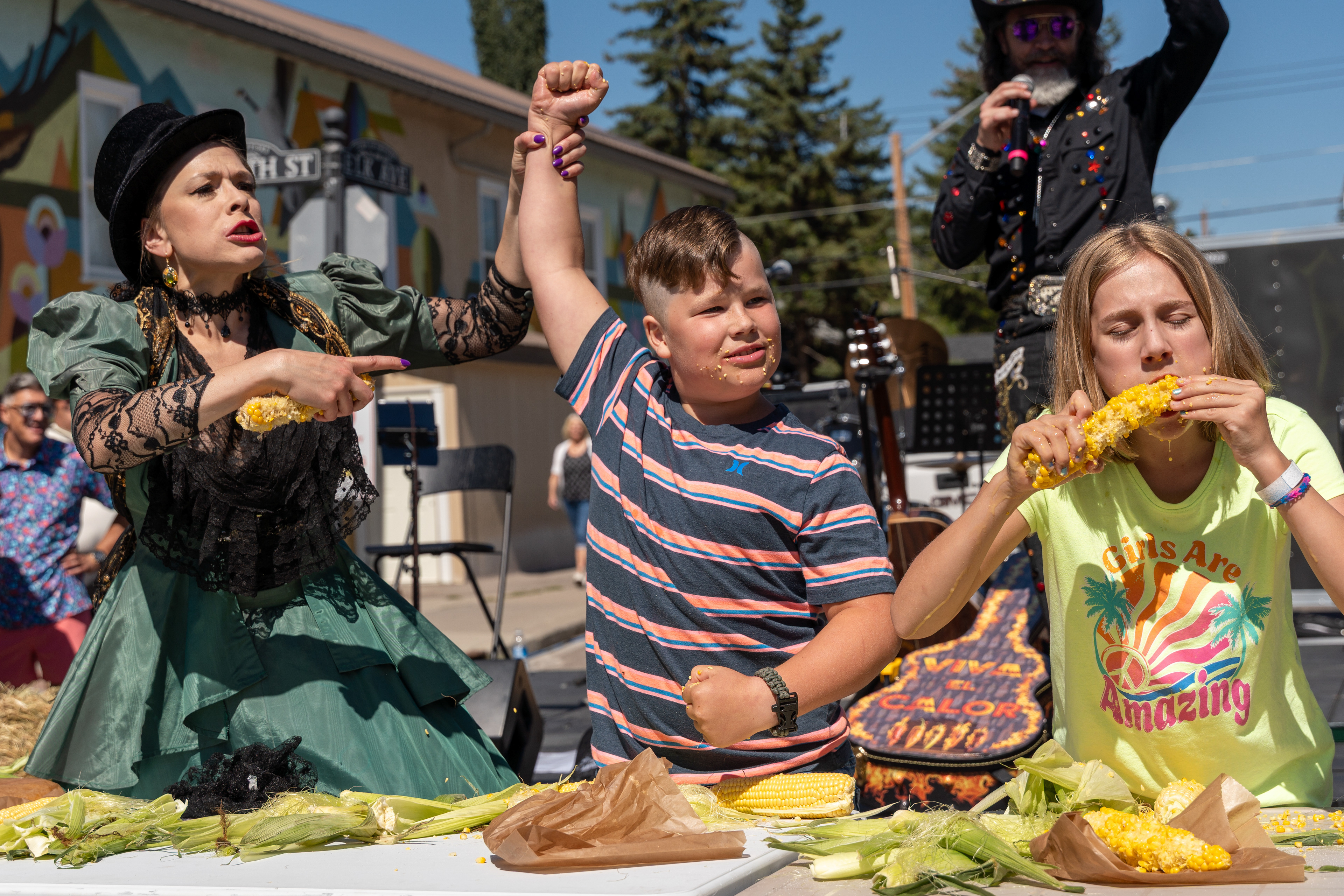 Oakley Lee wins the children’s corn eating challenge at the Okotoks Summer Round Up