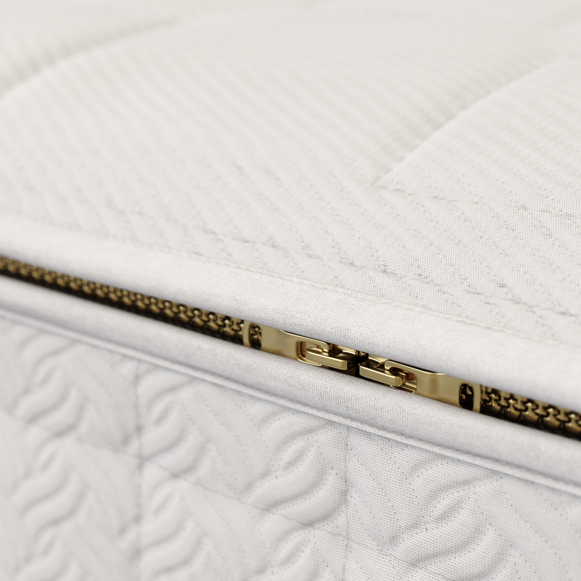 Close-up of a white mattress with a textured pattern and gold zipper, showing the quality and design of the EOS Series Naturpedic mattress.