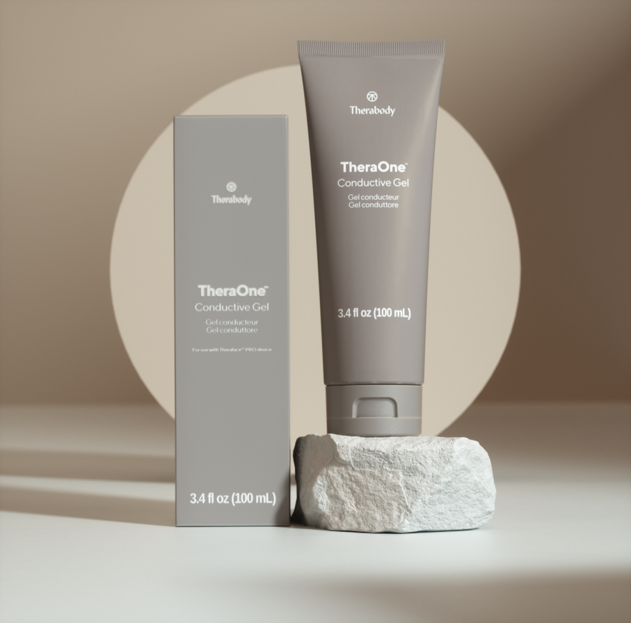 TheraOne Conductive Gel tube and box on a stone surface, with "TheraOne" and "3.4 fl oz (100 mL)" text visible.