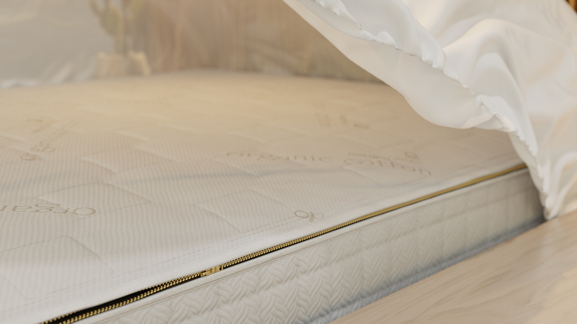 A close-up of a mattress with a zipper, showing the brand name "Naturpedic" on the fabric.