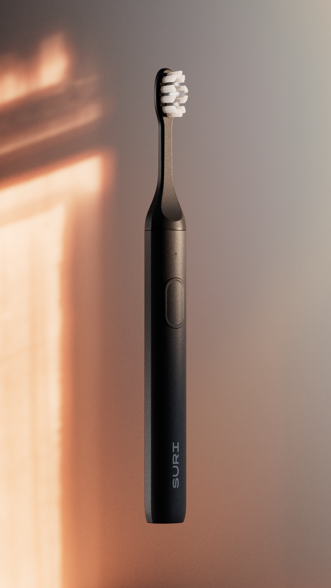 A black electric toothbrush with white bristles and a power button, labeled "SURI" on its handle.