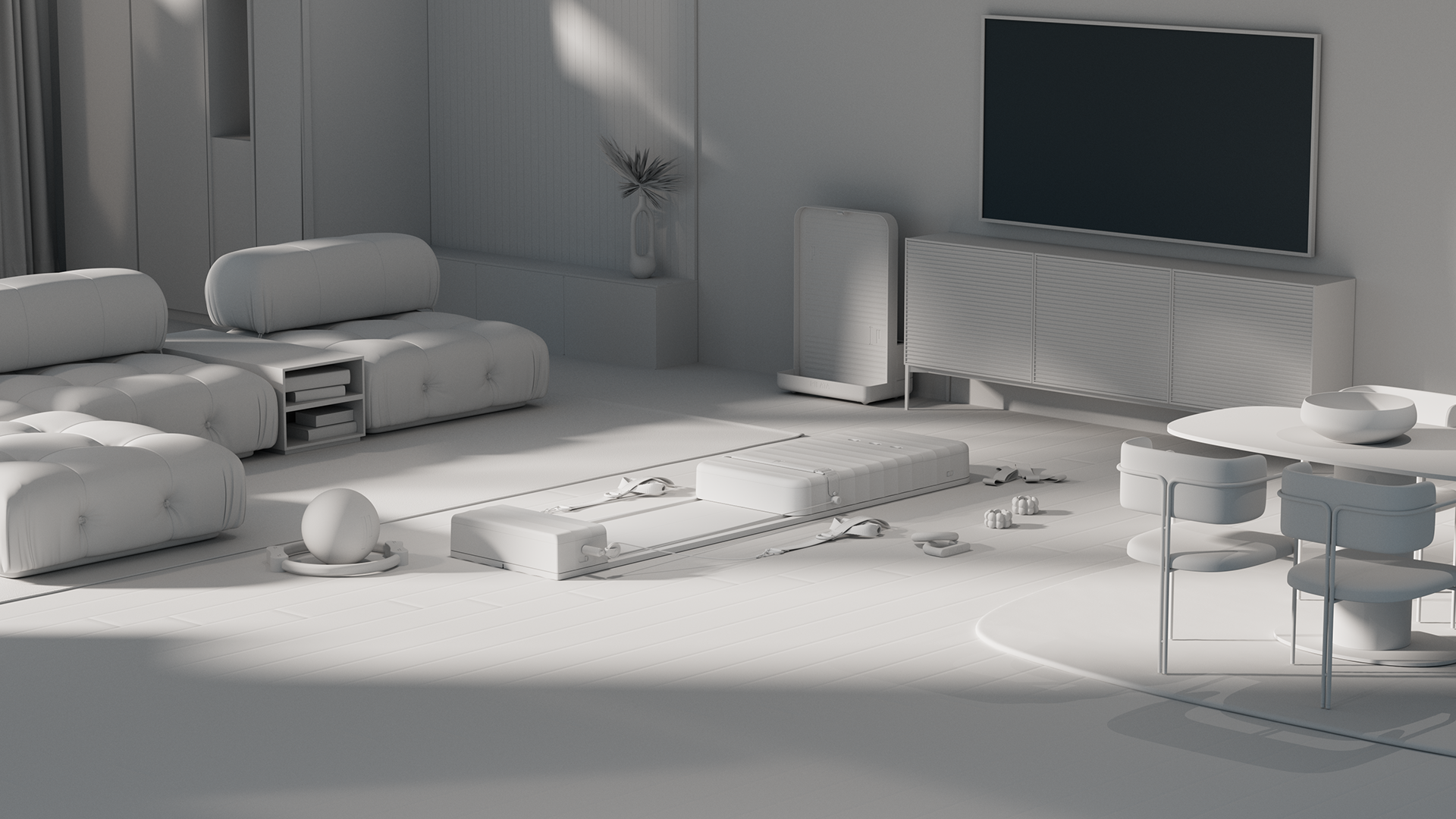 A minimalist living room with a large flat-screen TV, white furniture, and a sleek coffee table.