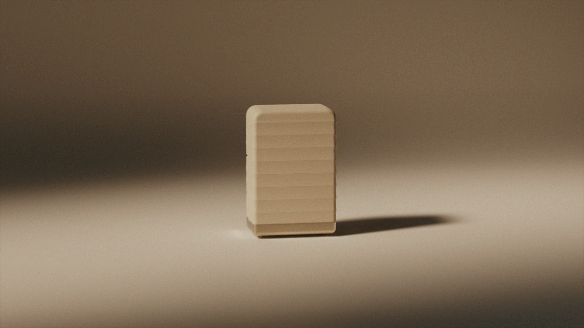 Animated sequence showing a folded beige-and-black Pilata reformer rotating against a neutral background.