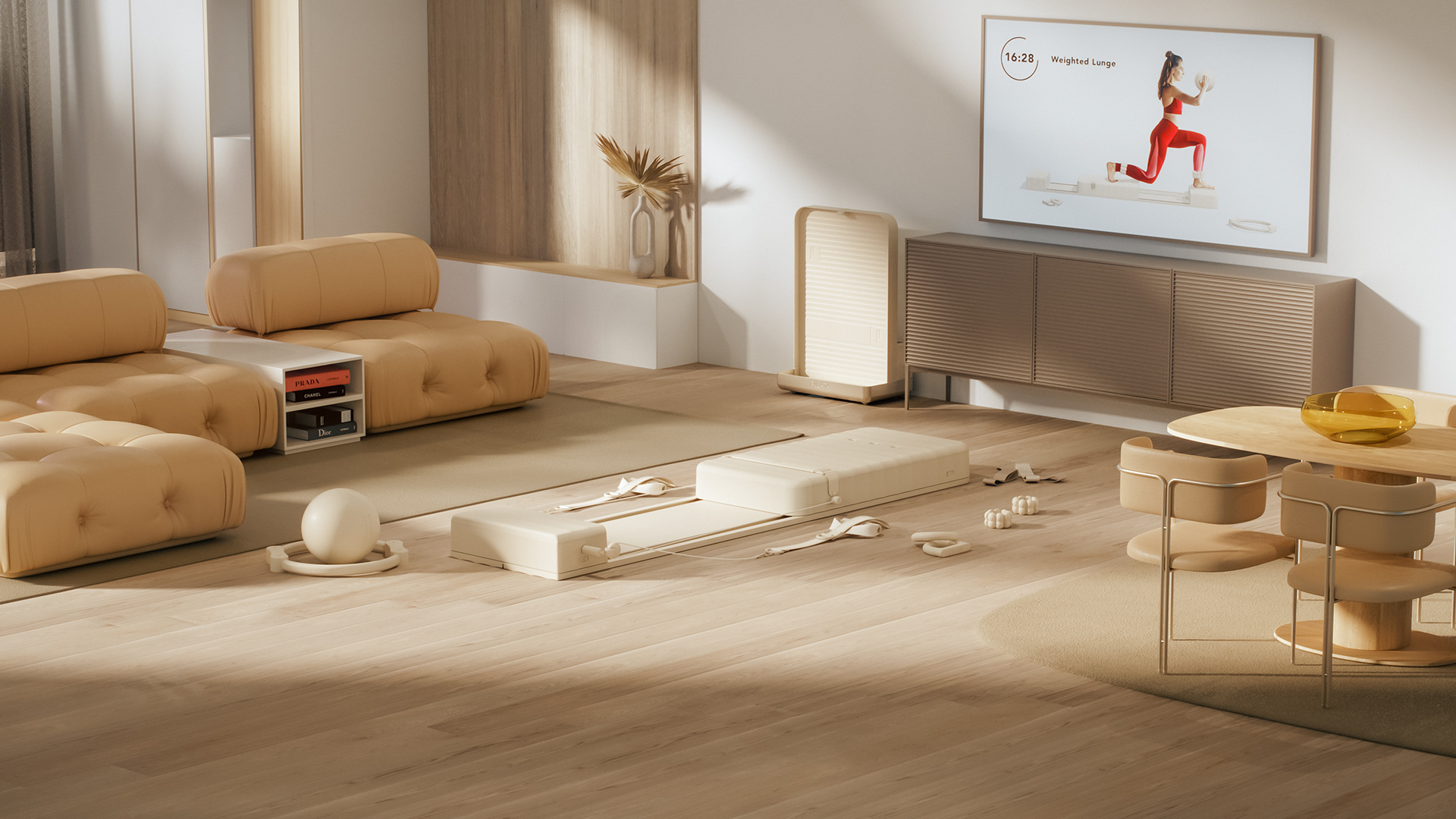 A modern living room with a wooden floor, beige furniture, and a large TV displaying a Pilates workout video.
