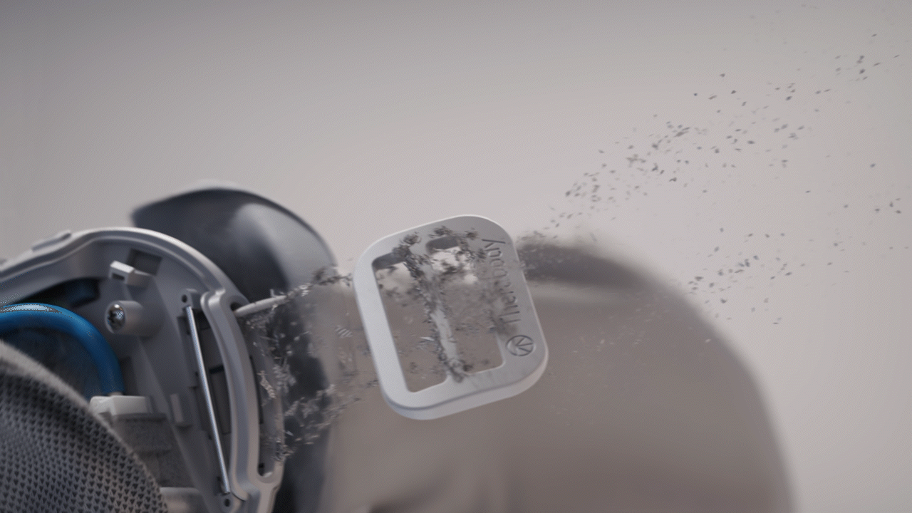 Animated sequence: A close-up of a white, textured strap with a logo on the left side, set against a blurred background.