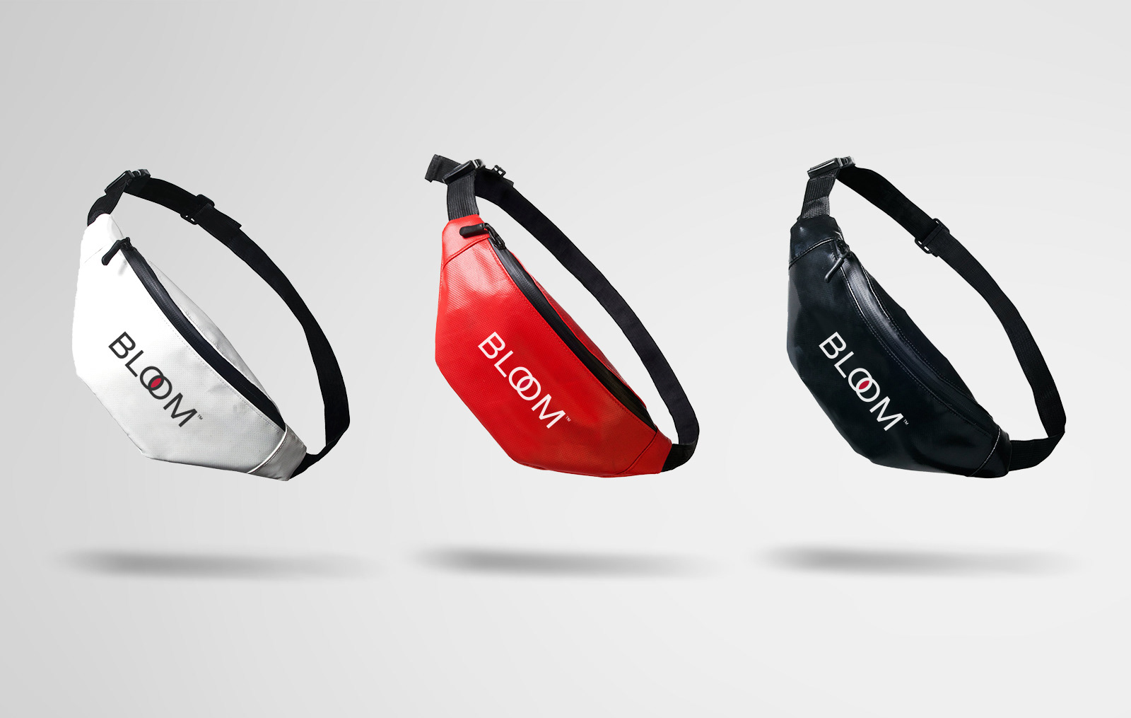 Three waist bags in white, red, and black, each displaying the brand name "BLOOM" on the front.