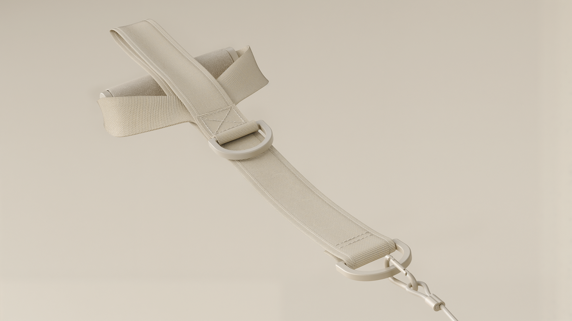 A beige Pilates strap with a metal buckle and loop.