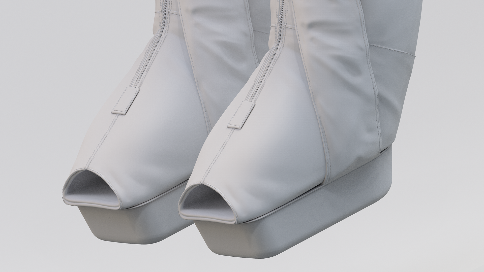 A pair of white, high-heeled jetboots with open toes.