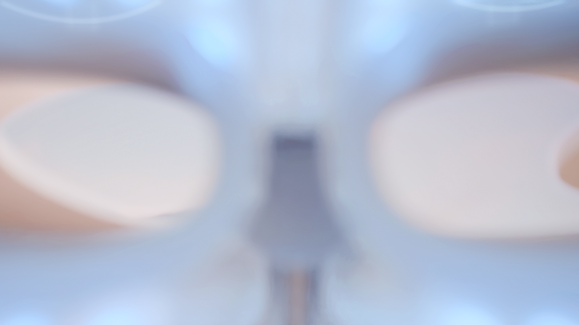 Animated sequence: A futuristic mask with glowing blue circles on the forehead and chest area, displaying advanced technology.