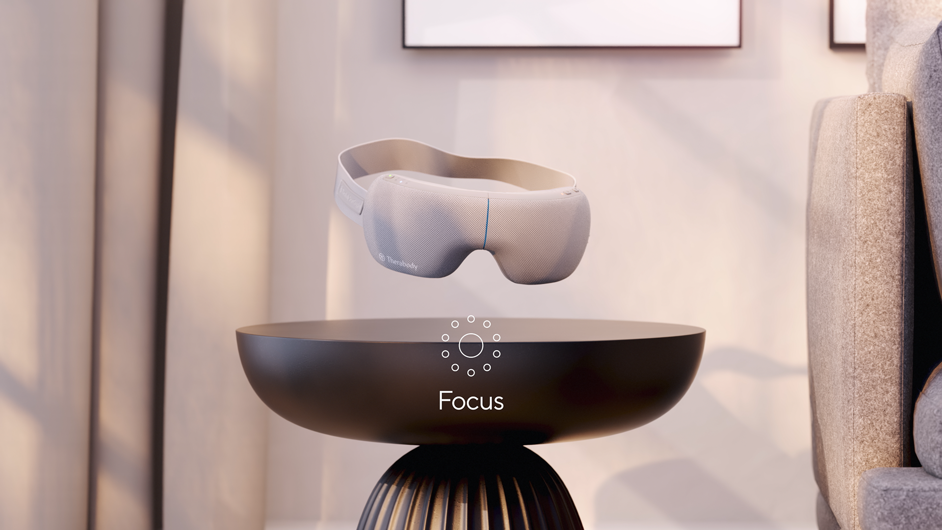 A futuristic smartgoggles device levitates above a sleek base, displaying the word "Focus" on its surface.