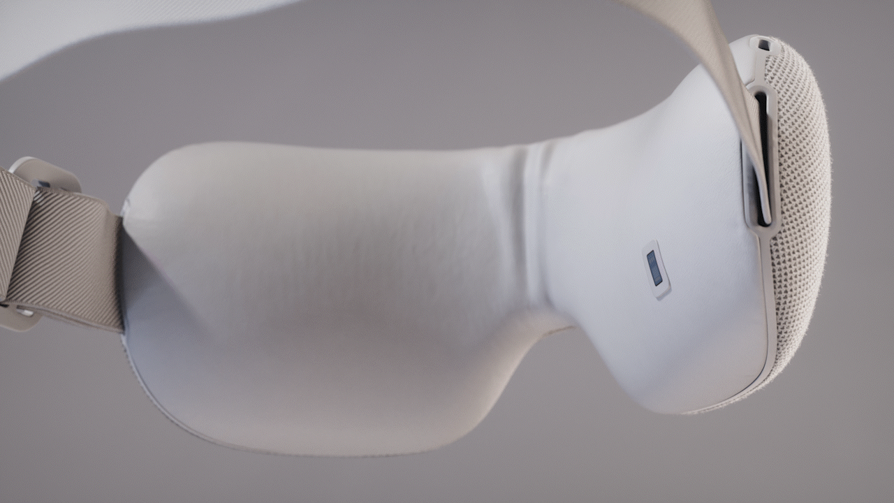 Animated sequence: A futuristic robotic glove with glowing blue lines on its surface, displaying the word "SMARTGOGGLES" on its side.