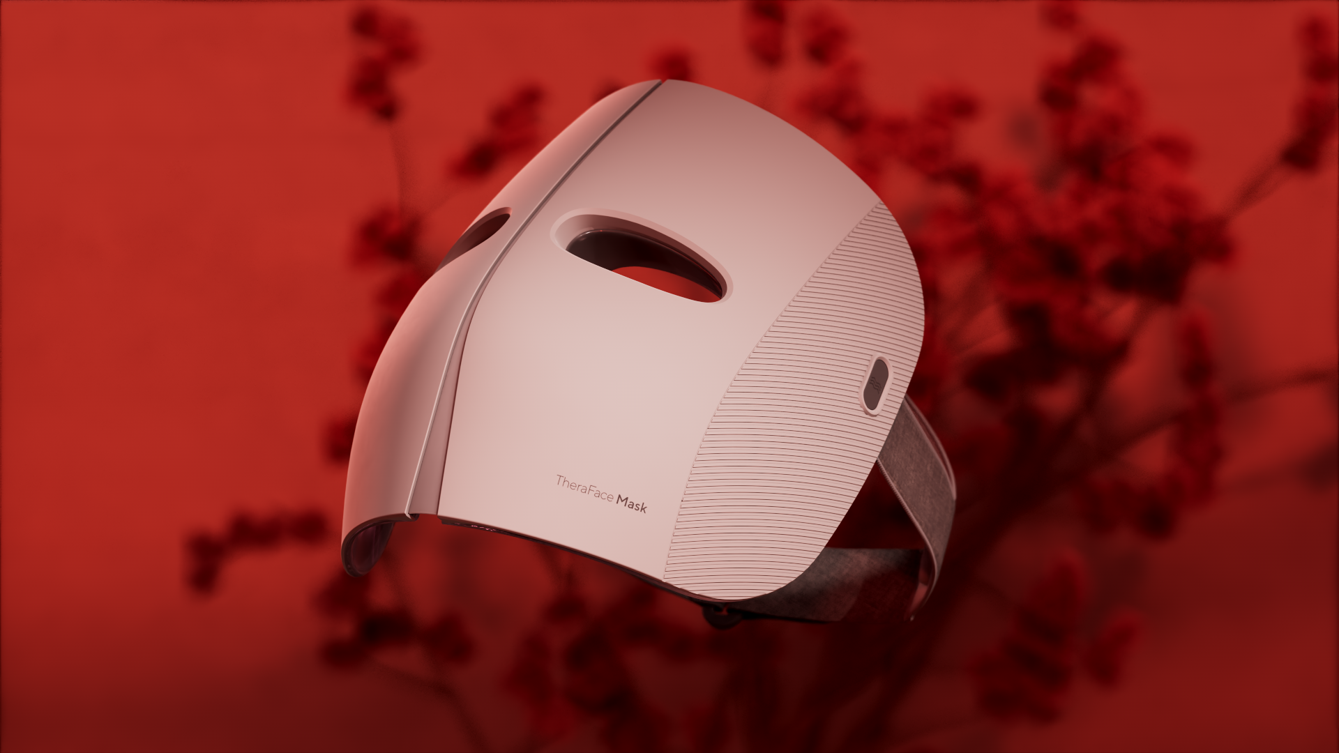 A sleek, white mask with a circular opening and a strap, set against a red background with blurred branches.