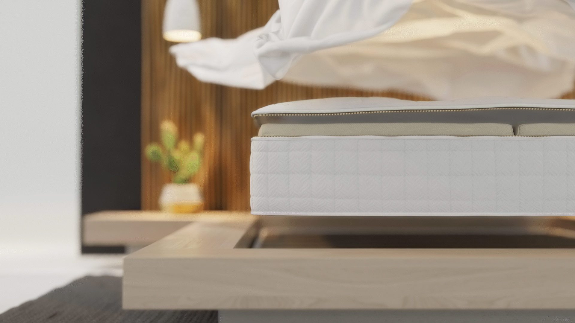 Animated sequence: A white mattress with a quilted pattern is shown in a modern bedroom setting, showing its comfort and design.