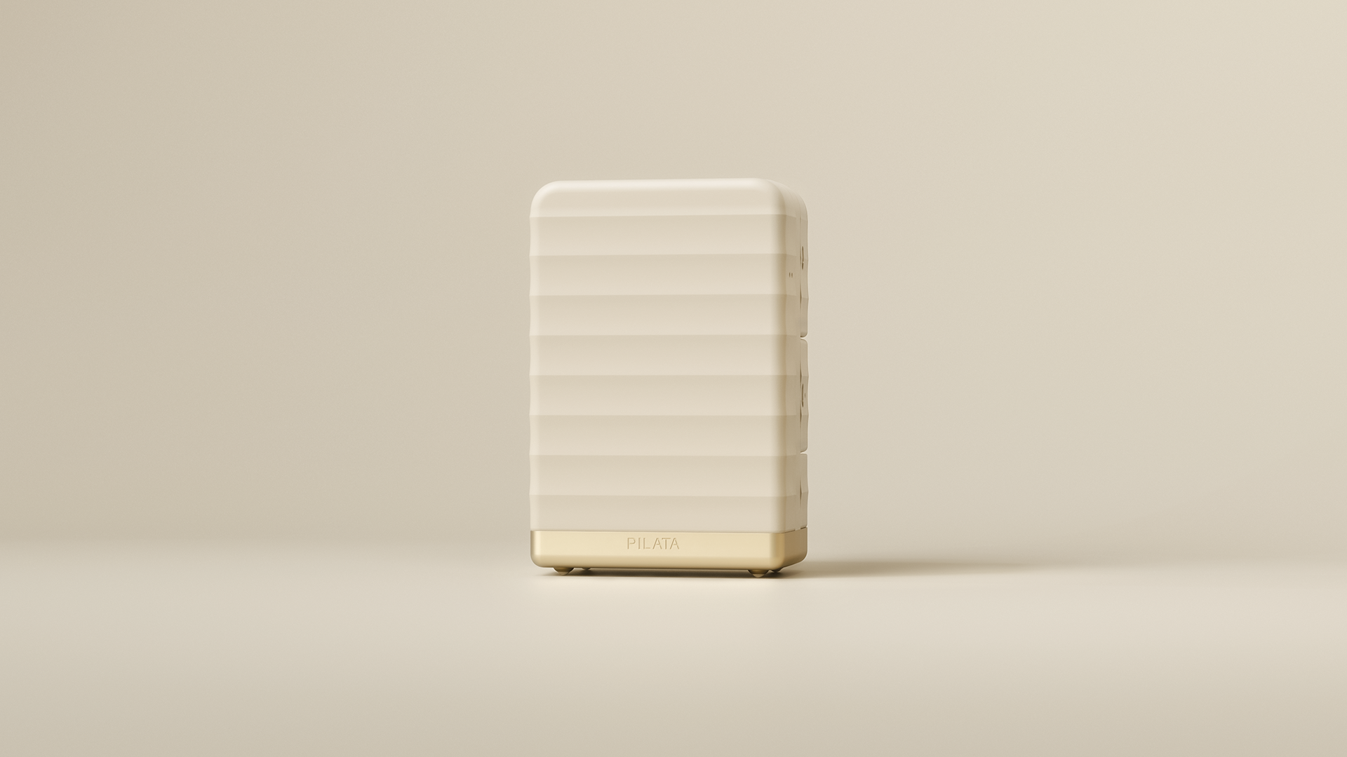A sleek, rectangular white device with a gold accent on the bottom, featuring the brand name "Pilata" in gold letters.
