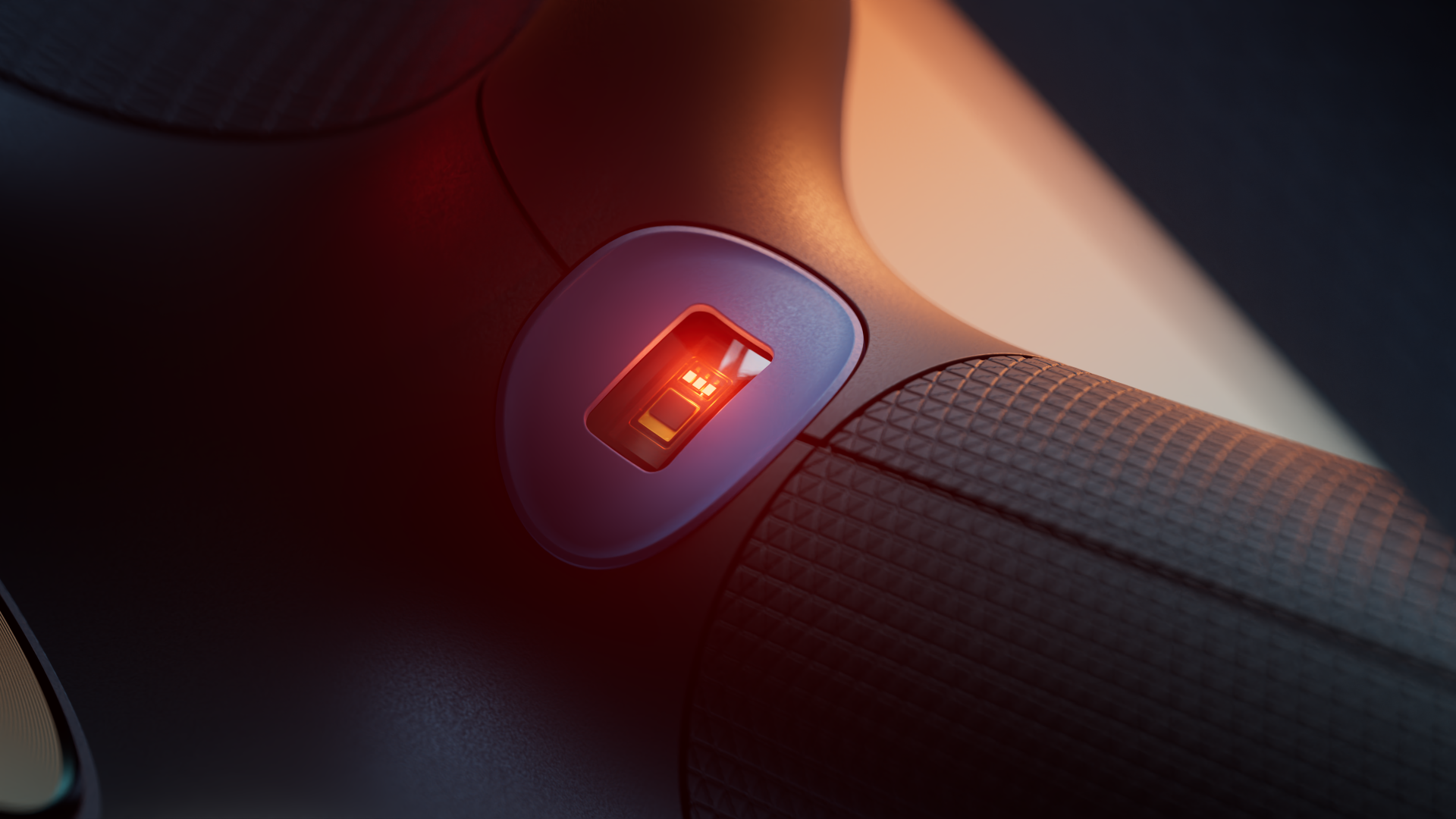 A close-up of a red-lit device with a textured surface.
