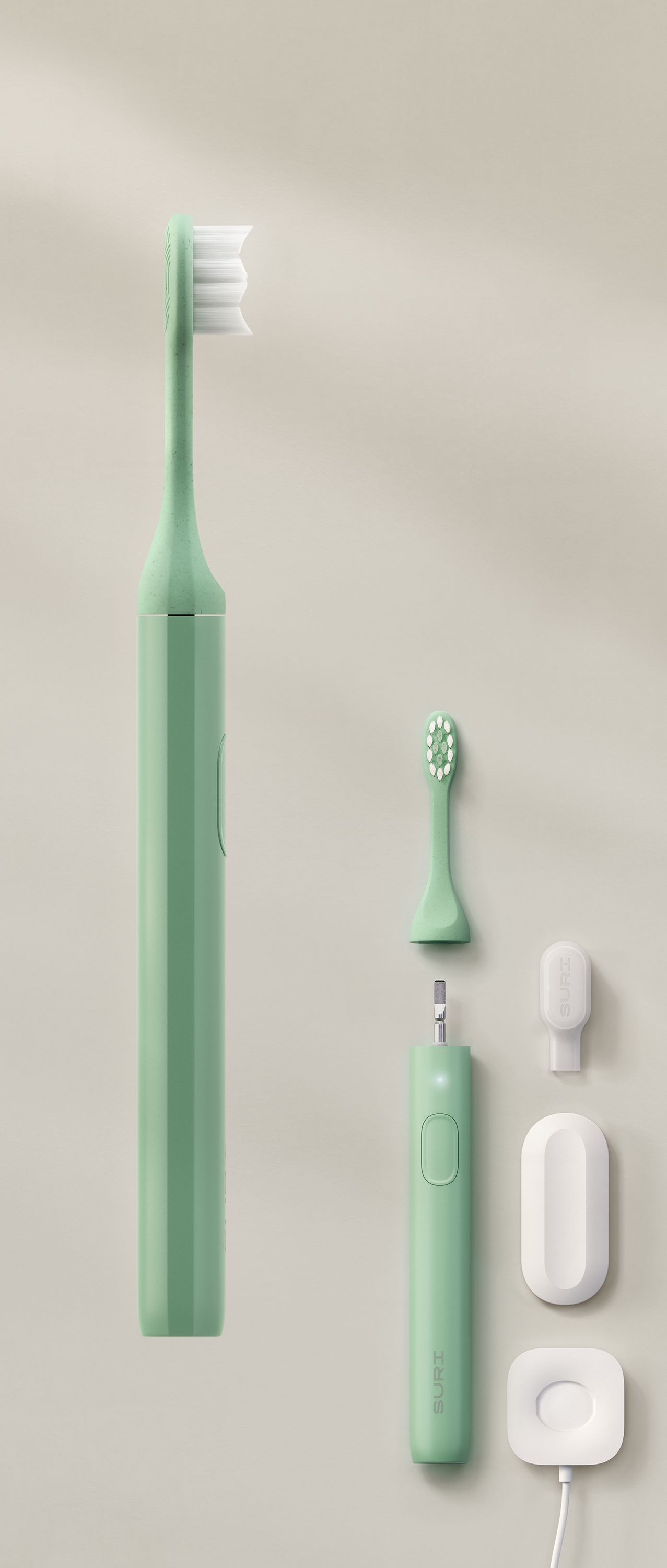 A mint green electric toothbrush with a charging dock, a brush head, and a white charging cable.