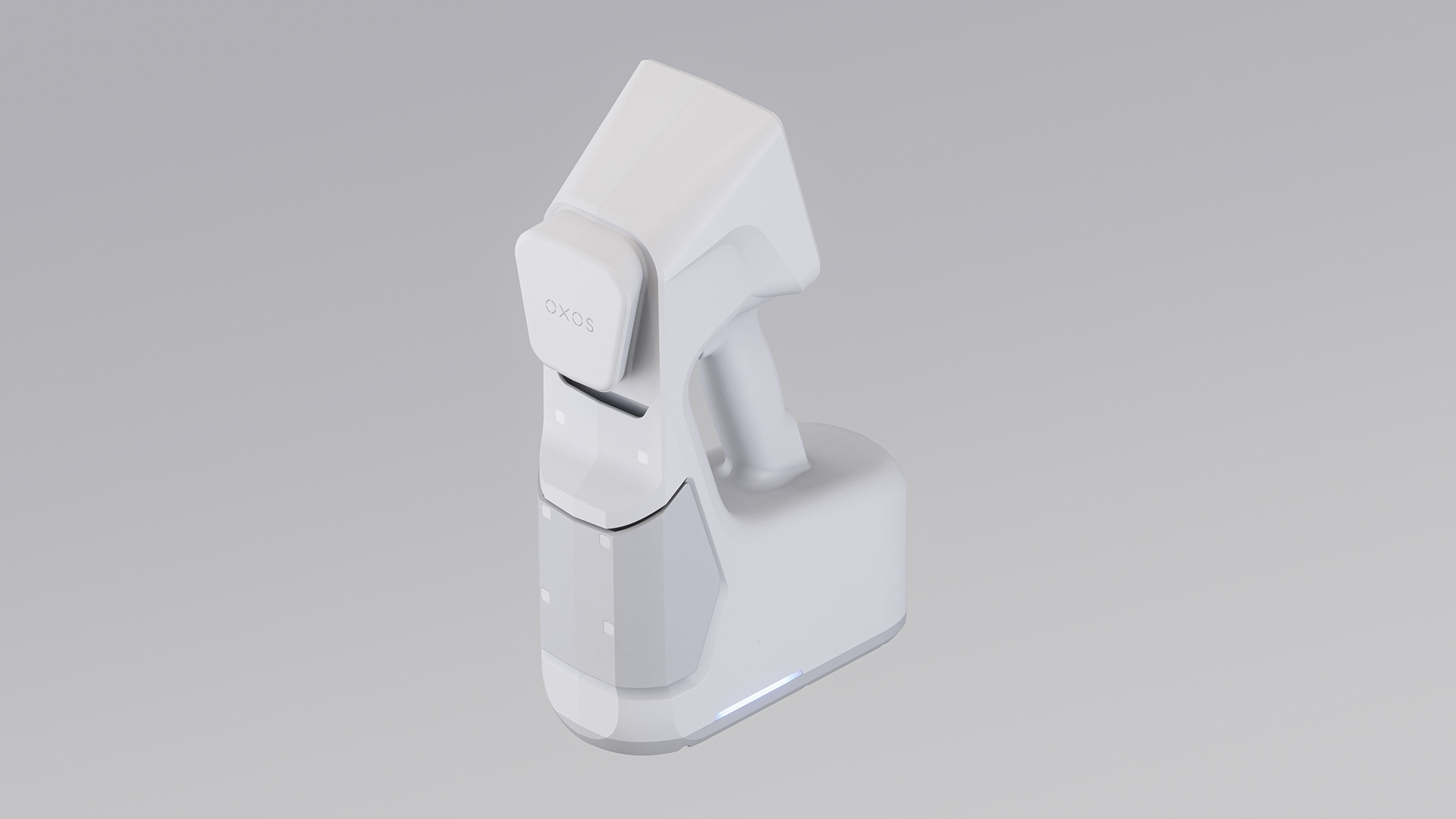 A sleek, white portable precision device with a minimalist design, featuring a digital display and control buttons.