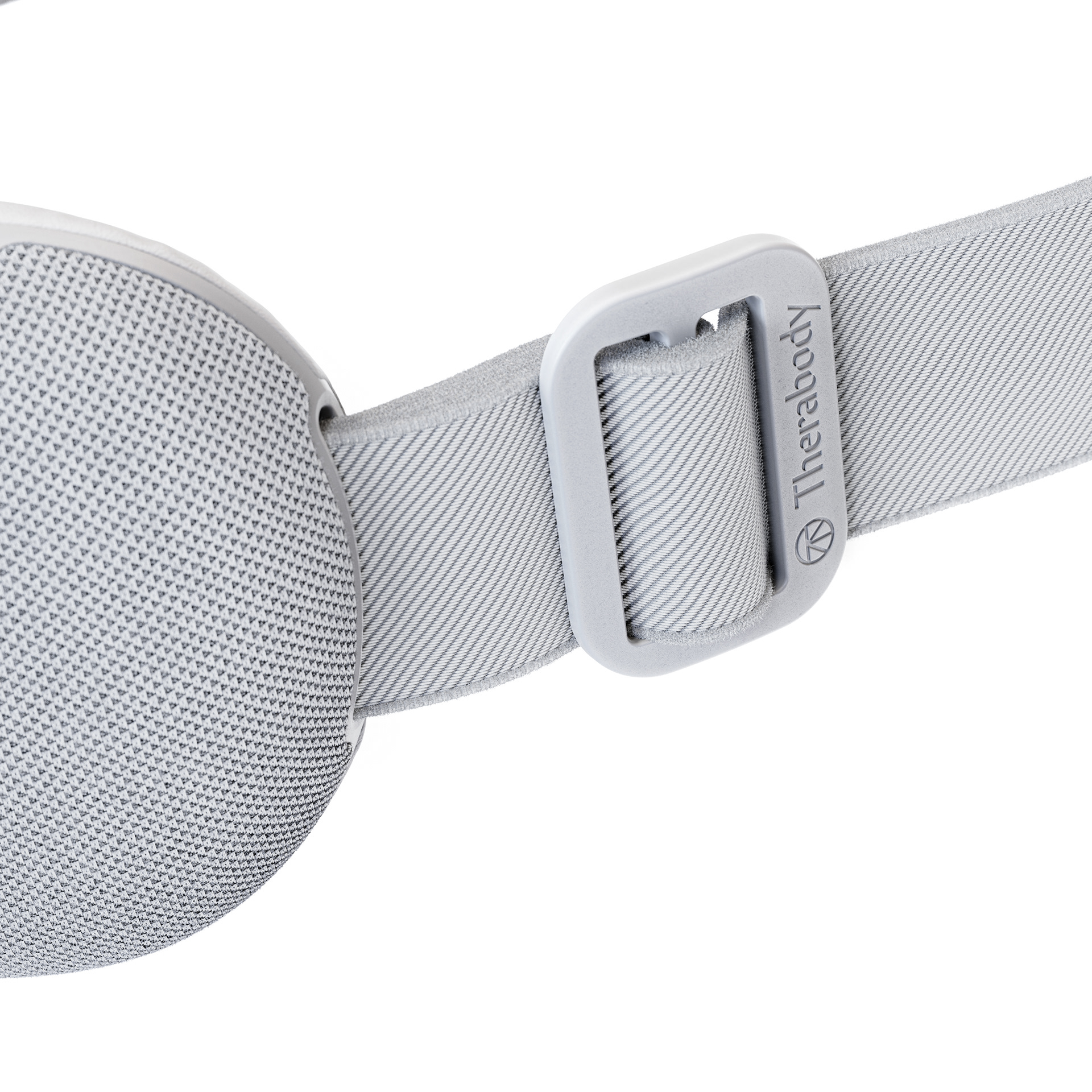 A close-up of a white, sleek smartgoggles with a textured strap and a metallic buckle, featuring the brand name Therabody on the buckle.