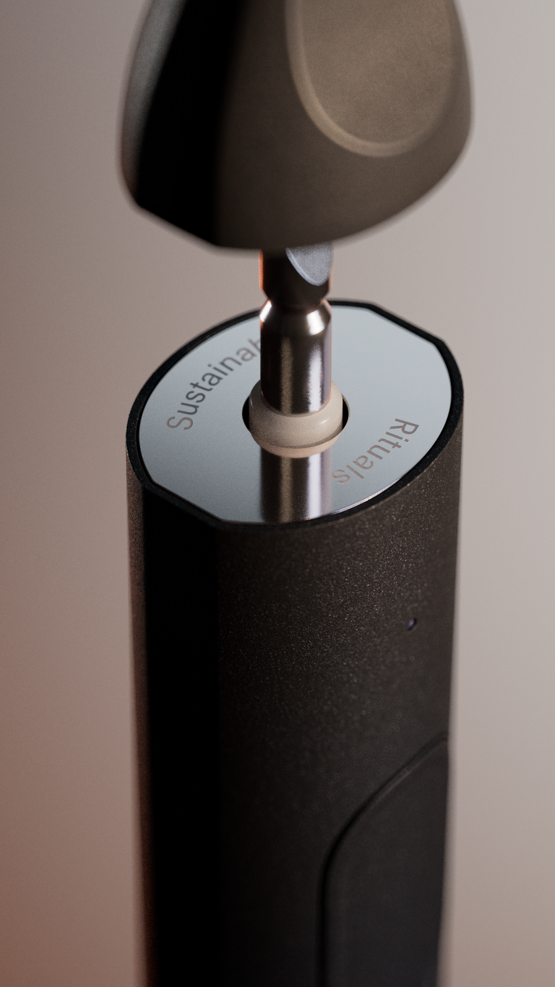 A black device with a metallic tip, featuring the word "Sustenance" on its side.