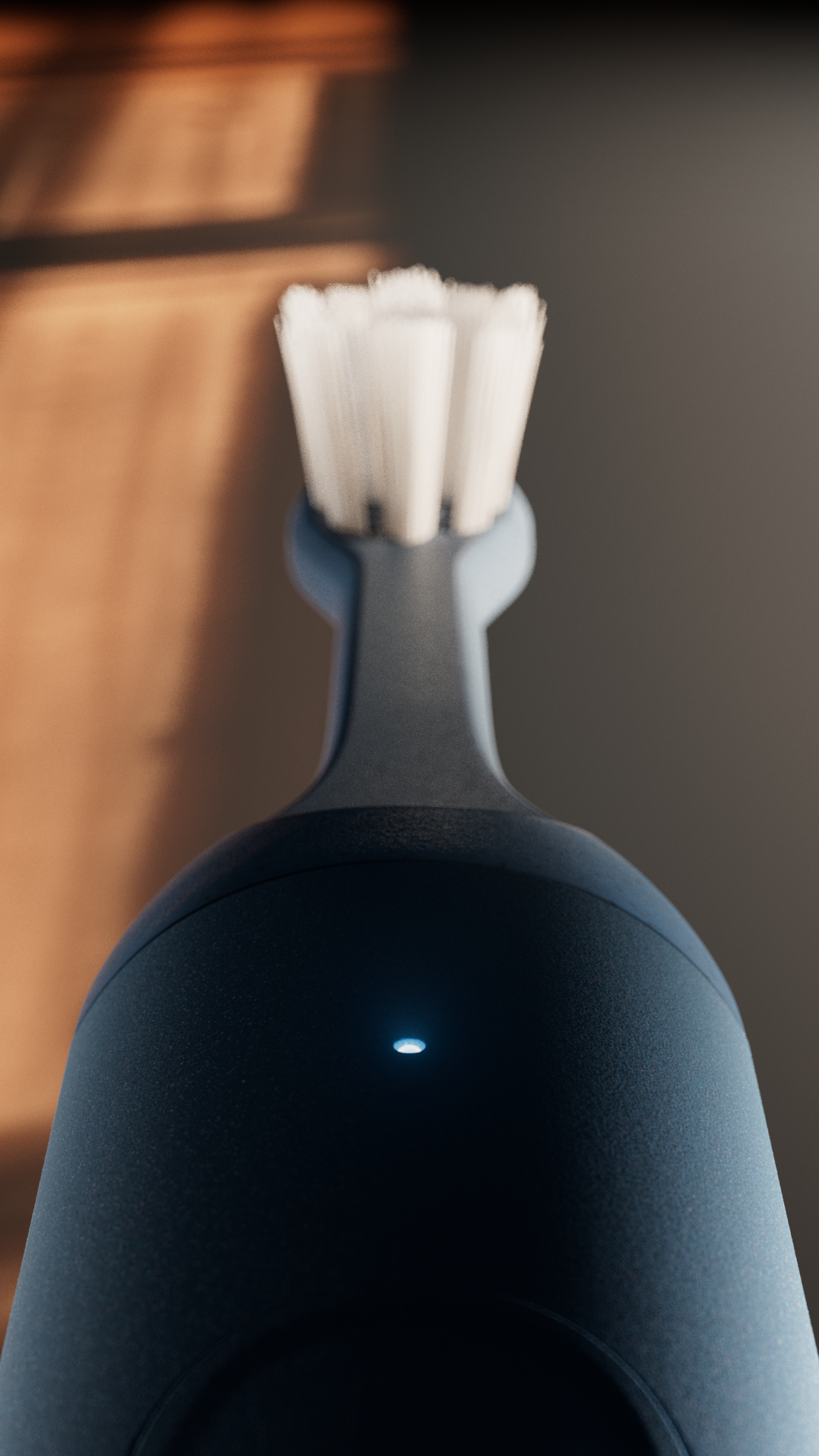 A close-up of a dark blue electric toothbrush with white bristles, showing the charging base with a glowing blue light.