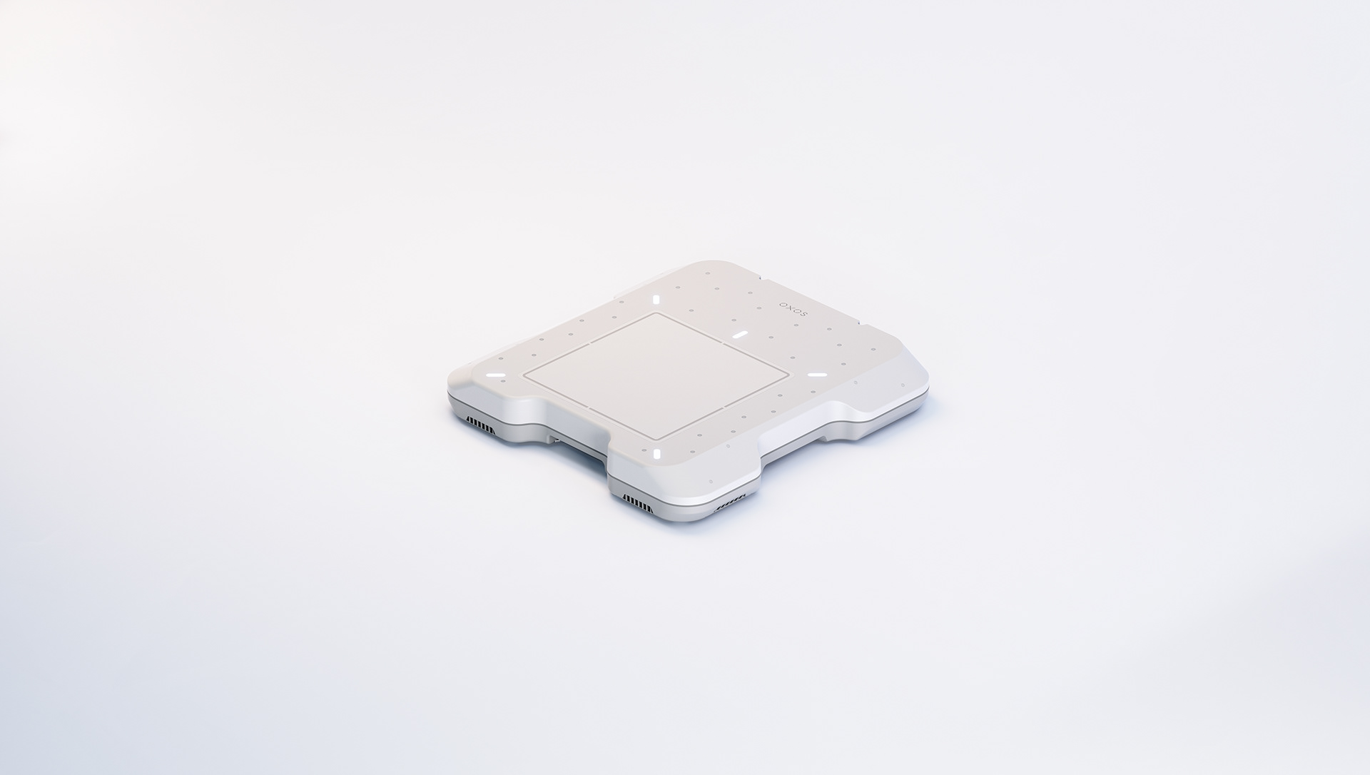 A sleek, white portable precision device with a rectangular sensor pad and a small display screen.