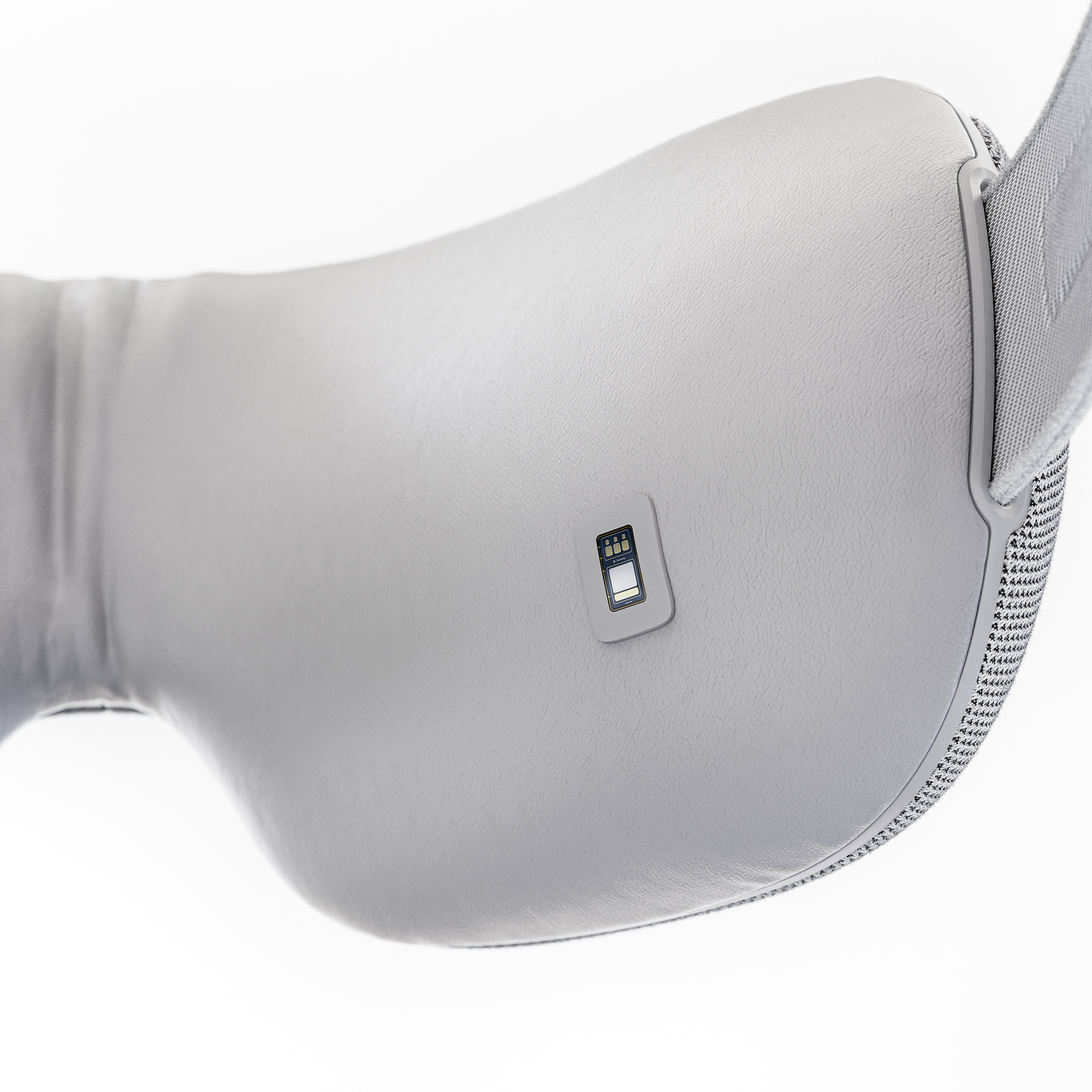 Smart glasses with a sleek design featuring a small rectangular display and a textured strap.