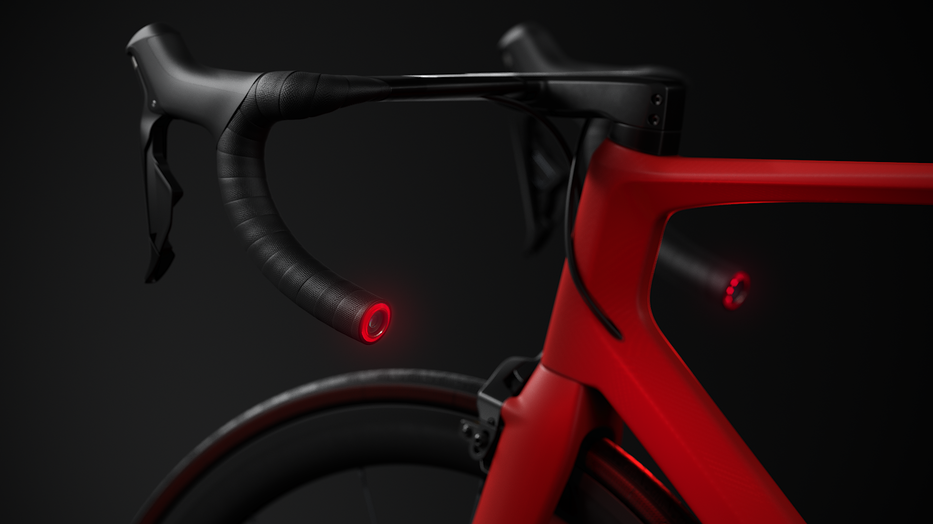 A red carbon fiber bicycle frame with black handlebars and red seat post, showing modern design elements.