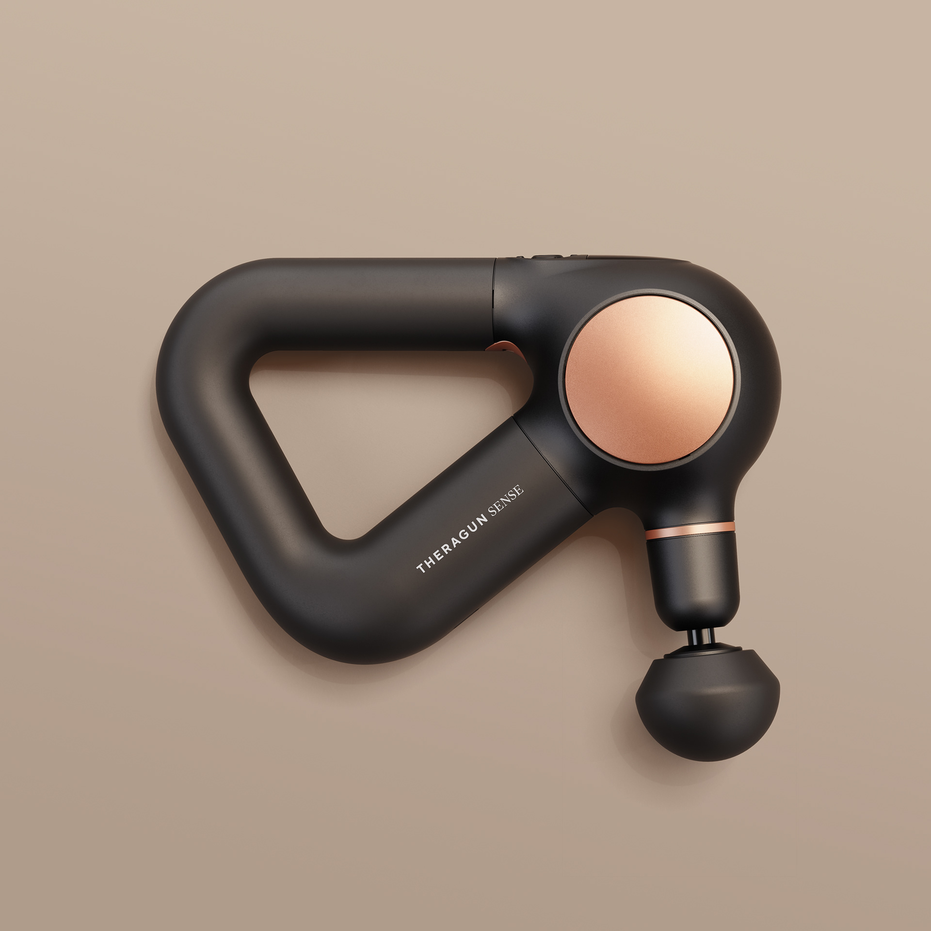 A black and rose gold Theragun Pro Plus massage gun on a neutral background.