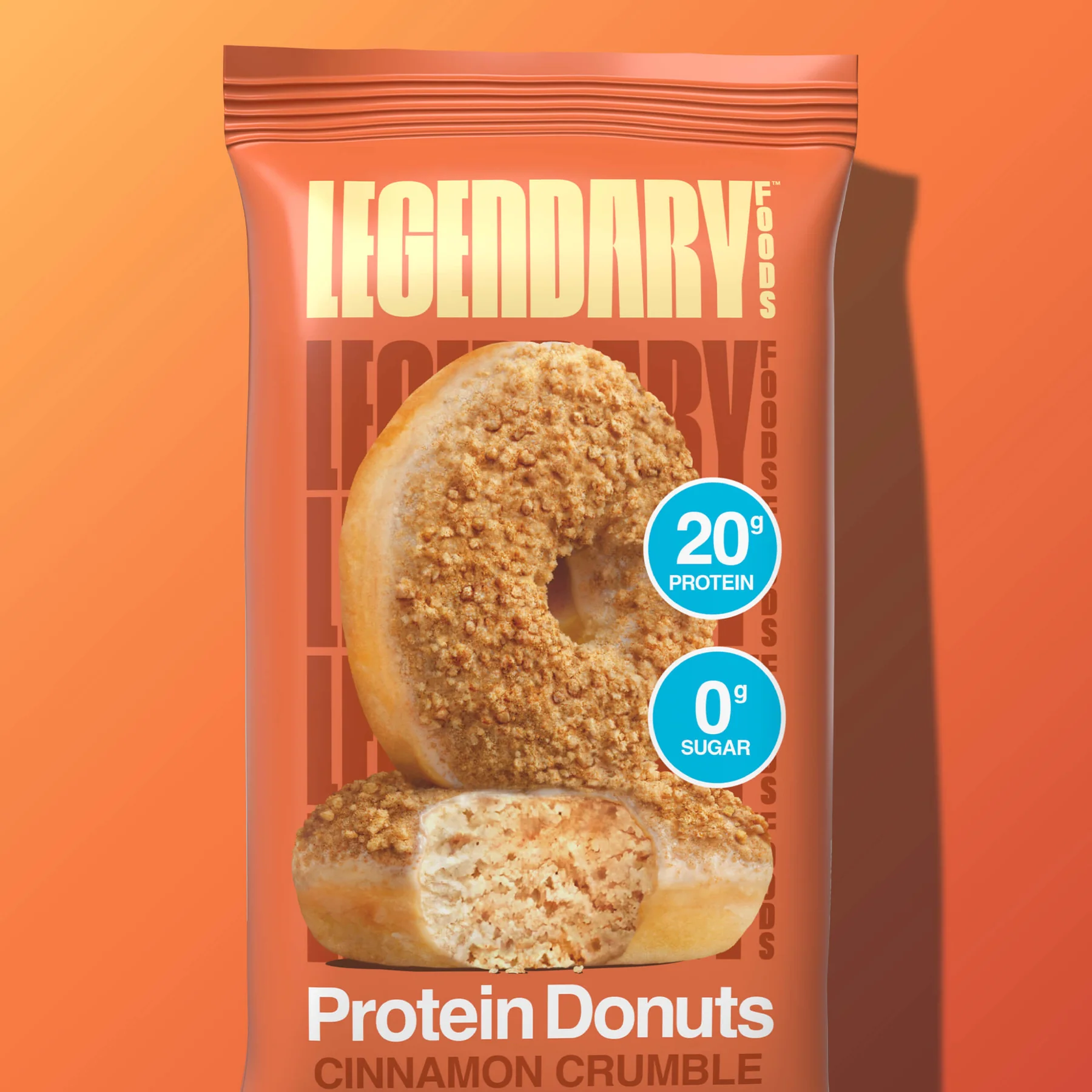 A package of Legendary Foods Protein Donuts with cinnamon crumble flavor, showing 20 grams of protein and zero sugar content.